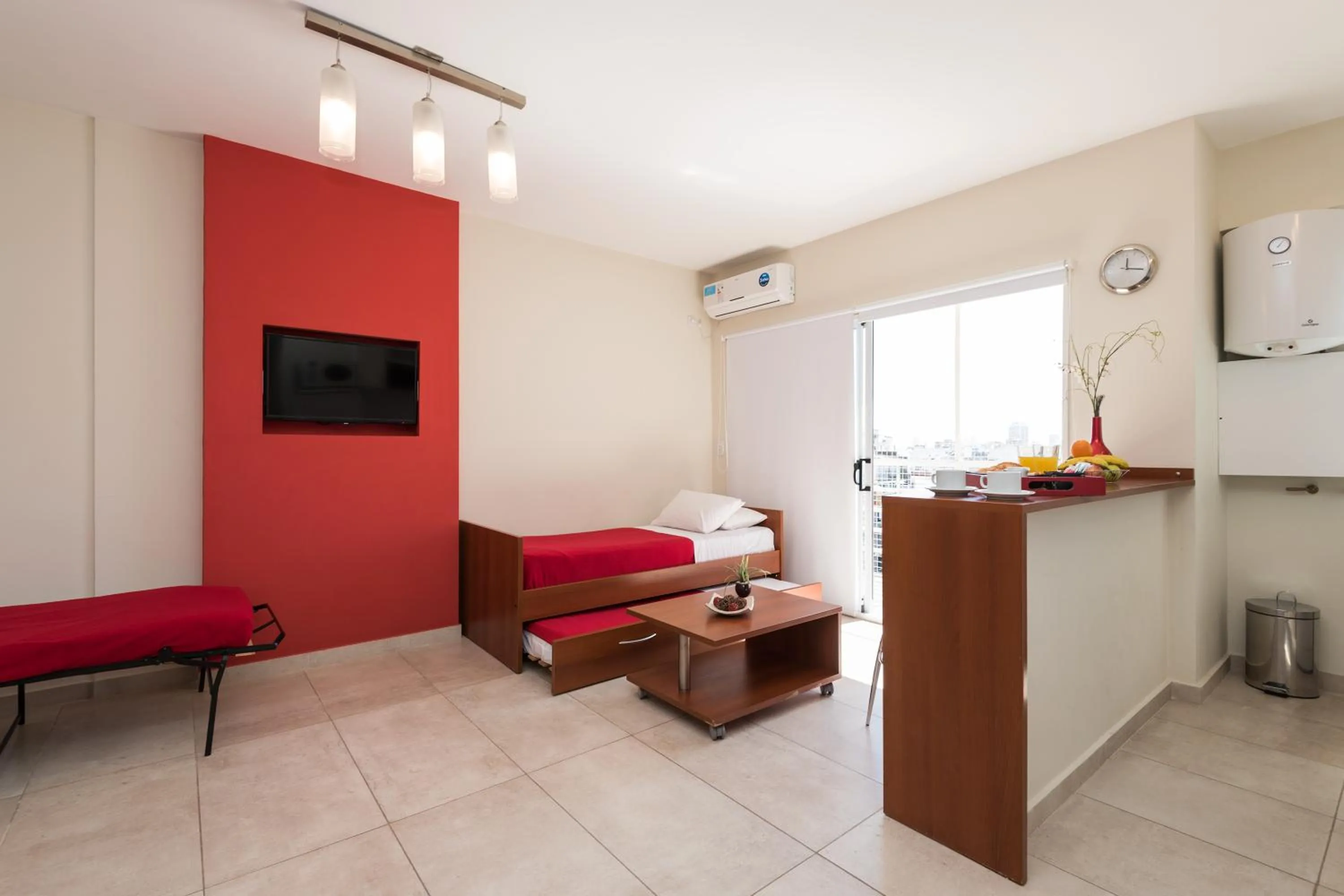 Photo of the whole room in Apart Hotel Independencia - Luz y Fuerza Patagonia