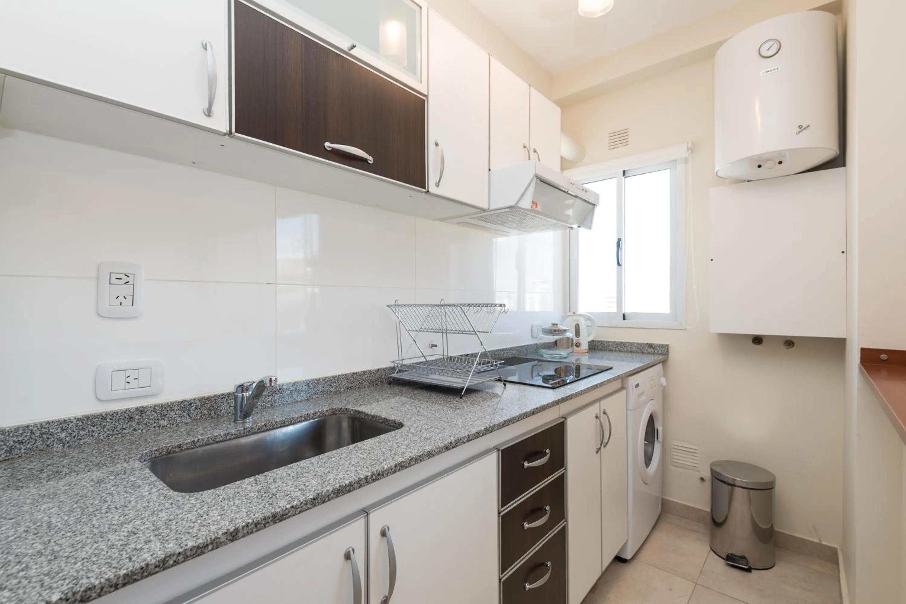 Kitchen or kitchenette in Apart Hotel Independencia - Luz y Fuerza Patagonia