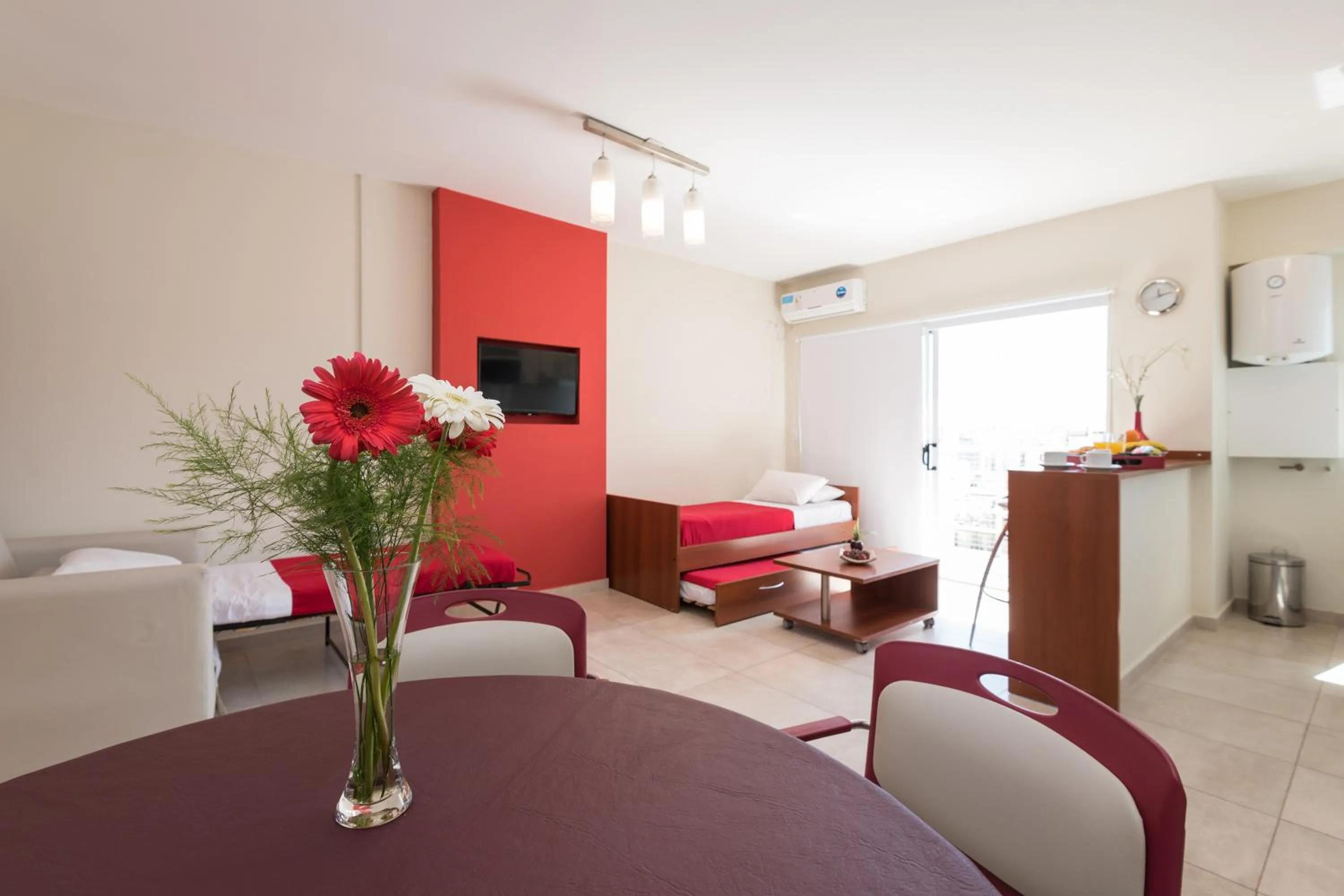 Photo of the whole room in Apart Hotel Independencia - Luz y Fuerza Patagonia