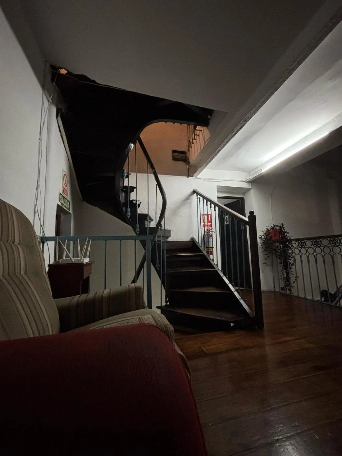 Communal lounge/ TV room in Montevideo Chic Hostel