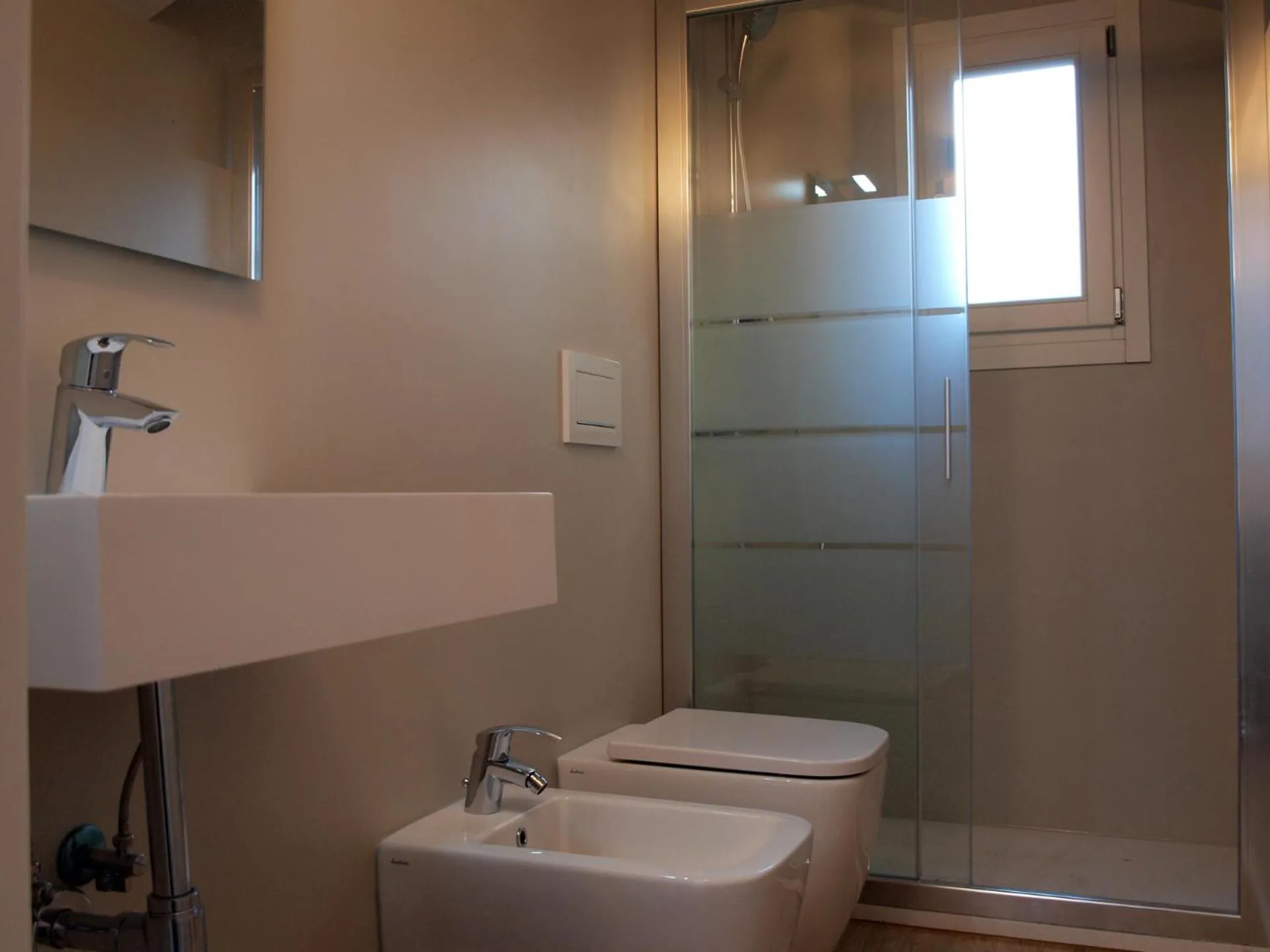 Toilet in Acquaderni Rooms