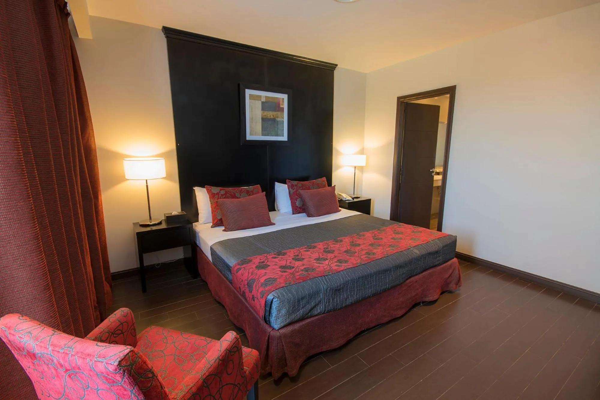 Bed in Grand Crucero Hotel