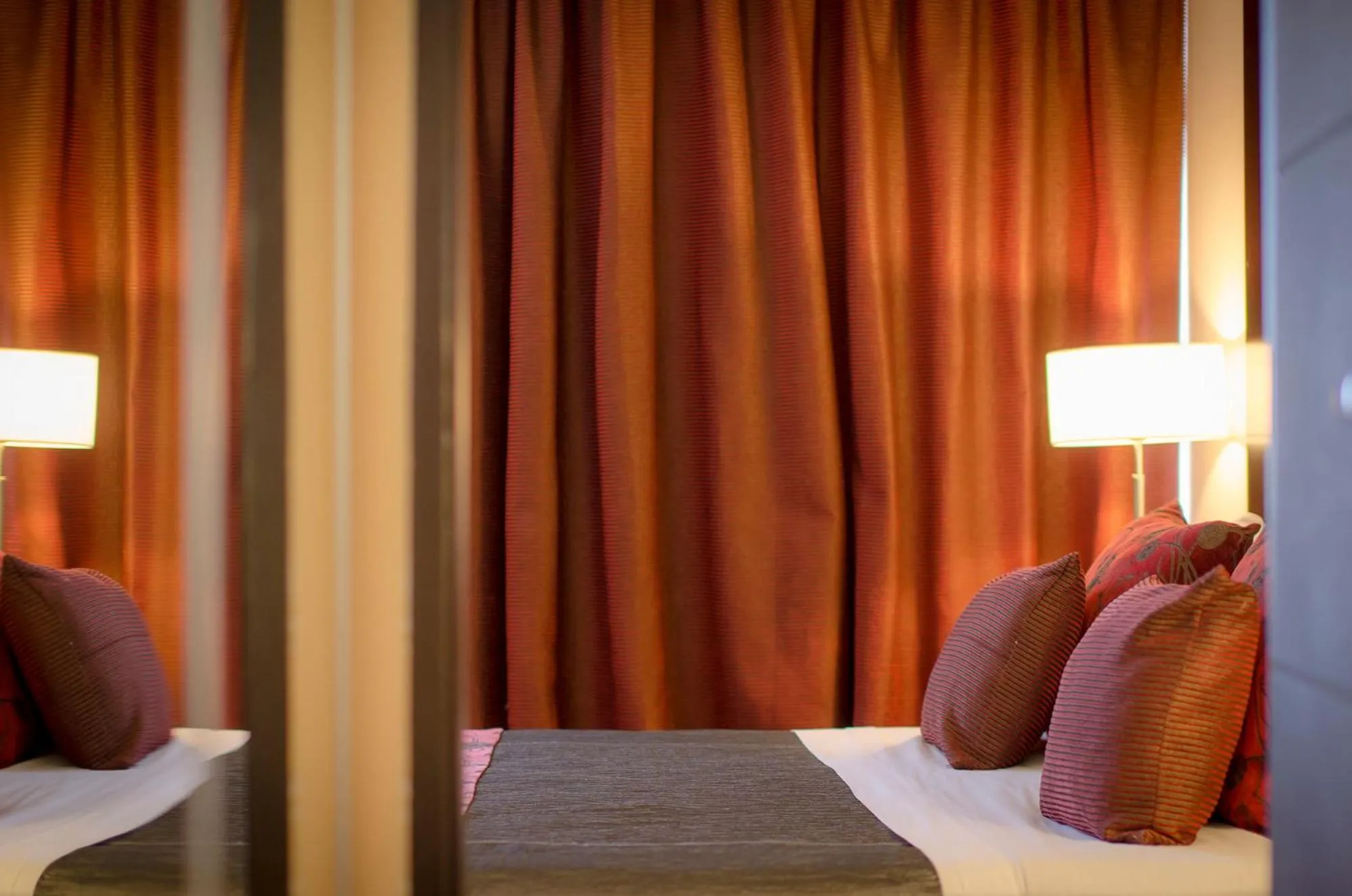 Bed in Grand Crucero Hotel