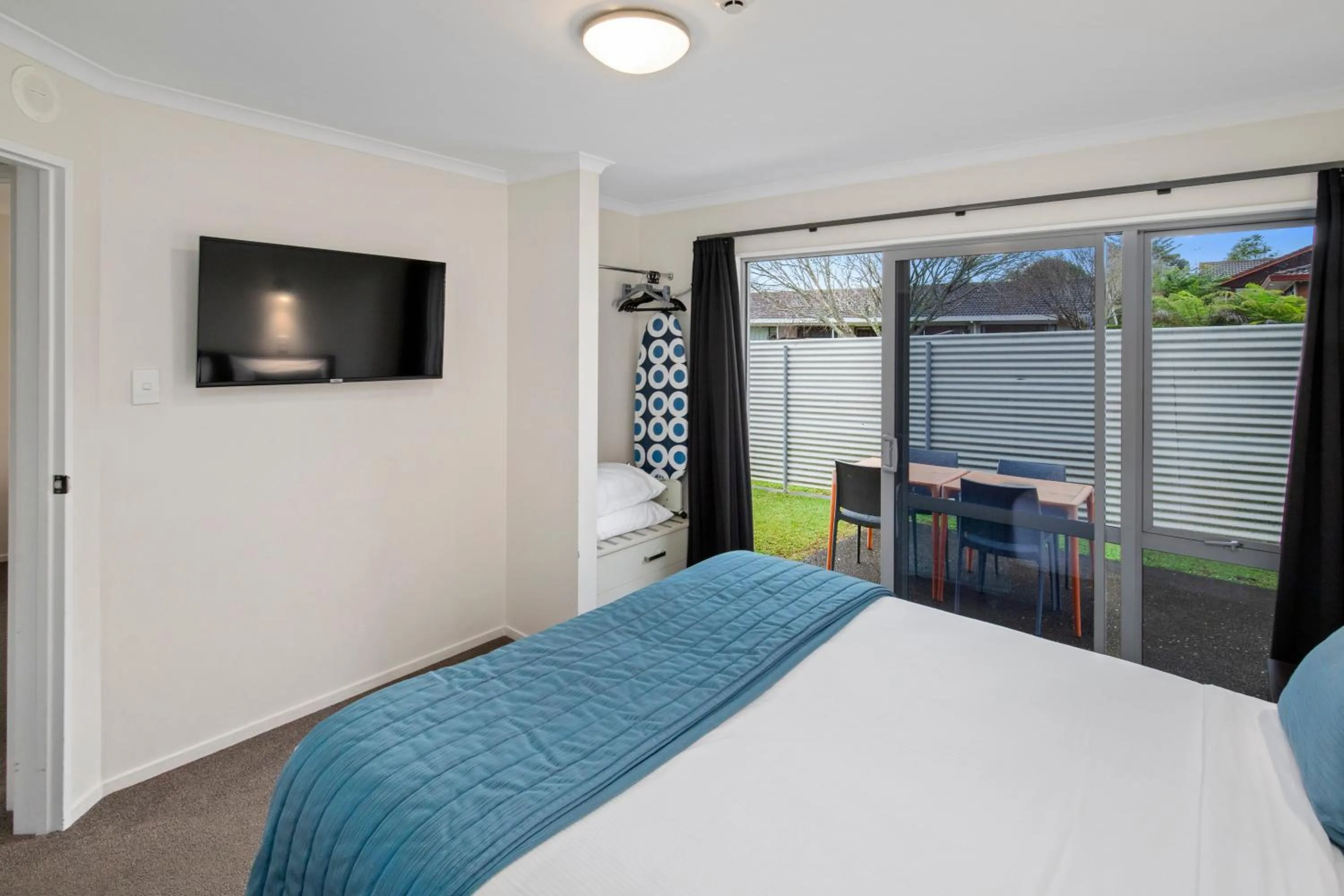 Bed in ASURE Aveda Motor Lodge