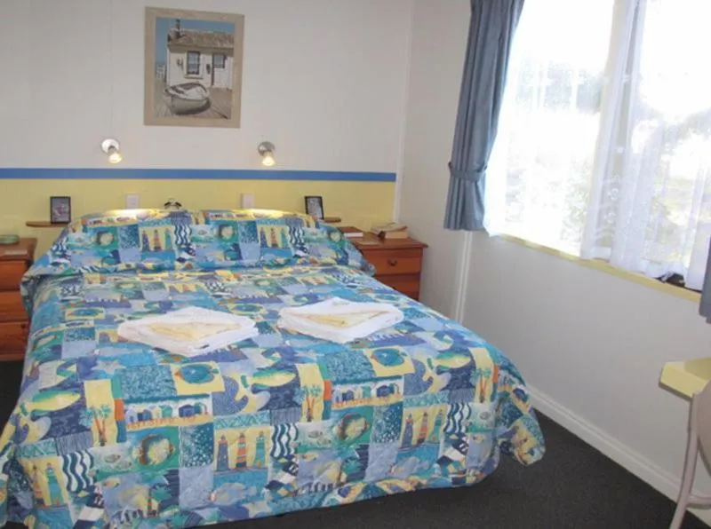 Bed in King Island Accommodation Cottages