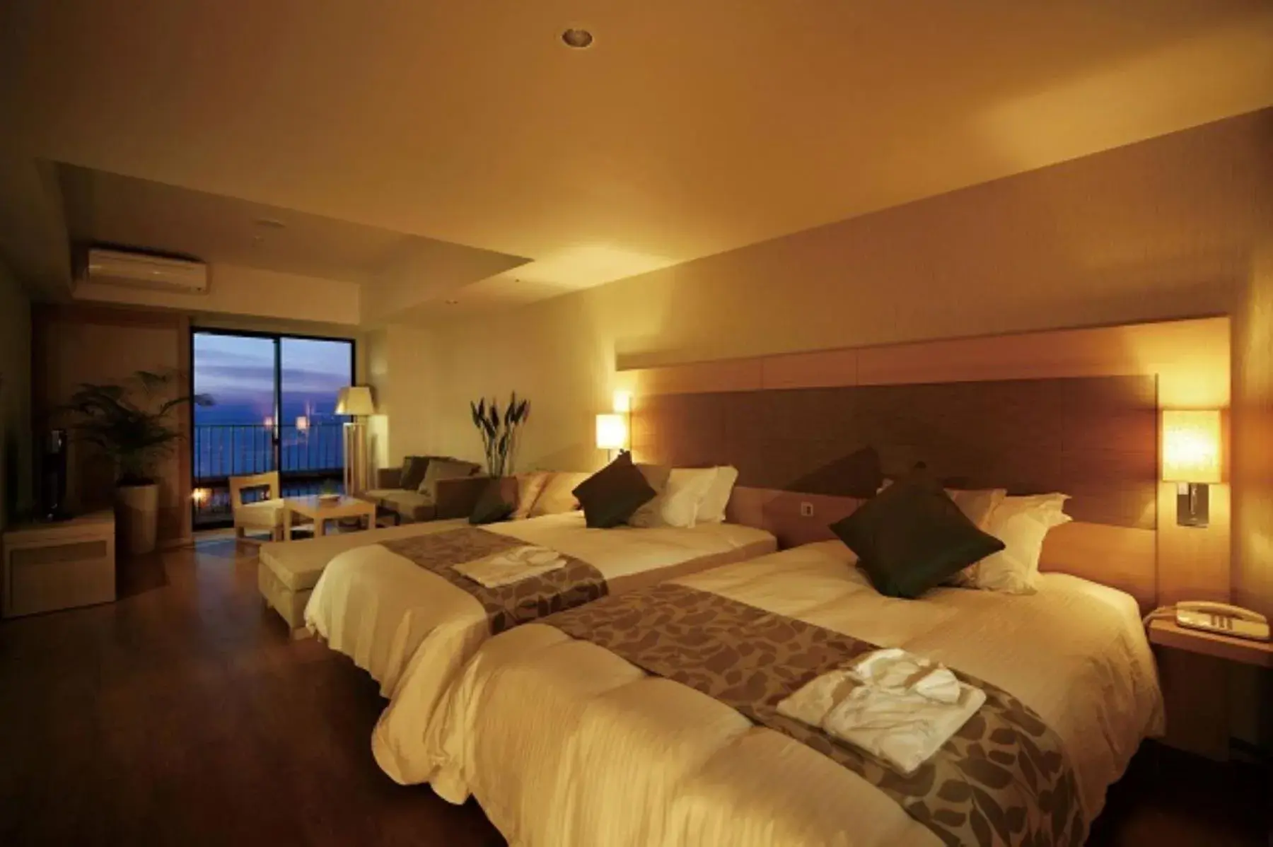 Bed in Moon Ocean Ginowan Hotel & Residence Bed in Moon Ocean Ginowan Hotel & Residence
