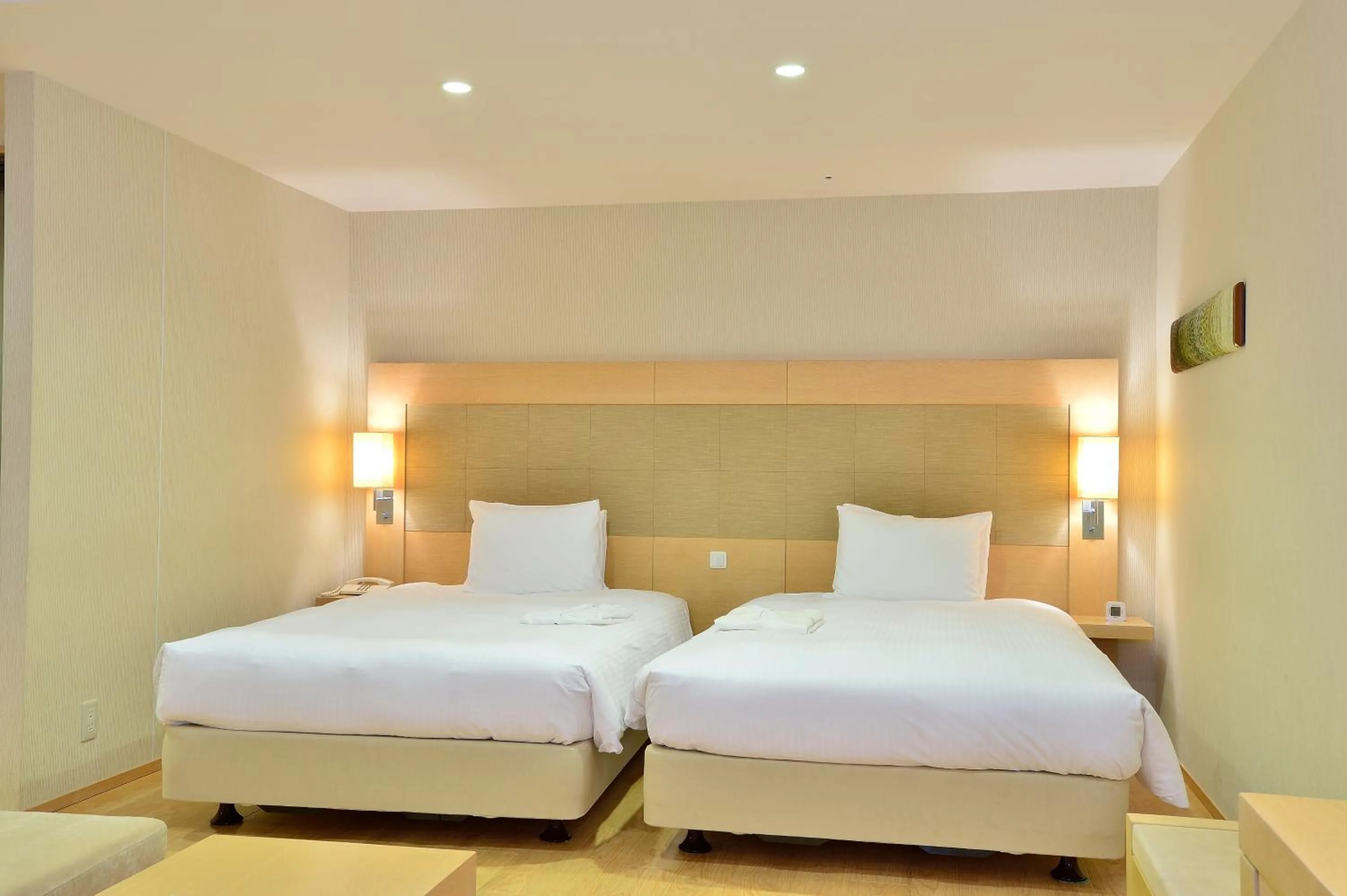 Bed in Moon Ocean Ginowan Hotel & Residence