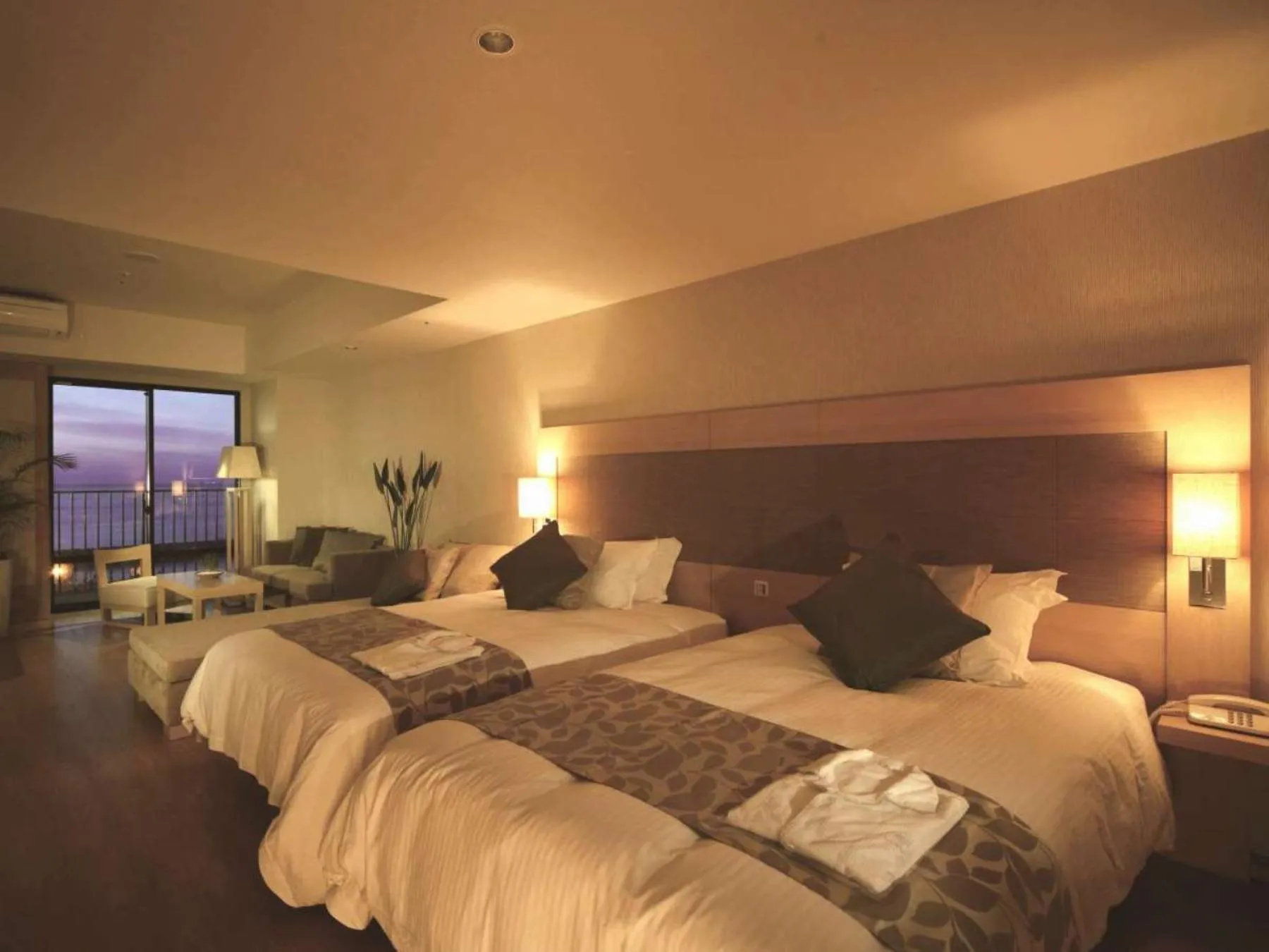 Bed in Moon Ocean Ginowan Hotel & Residence