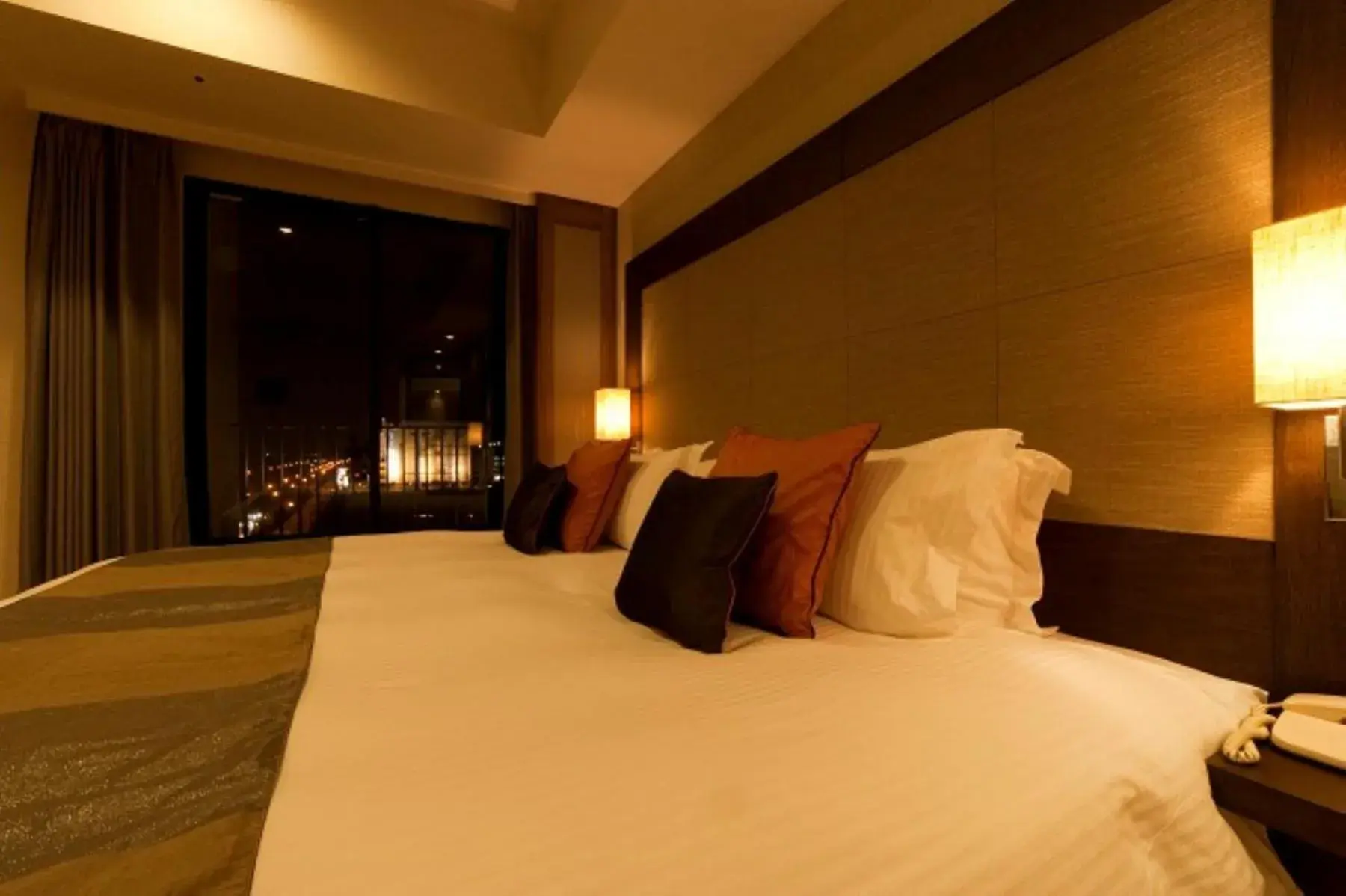 Bed in Moon Ocean Ginowan Hotel & Residence Bed in Moon Ocean Ginowan Hotel & Residence