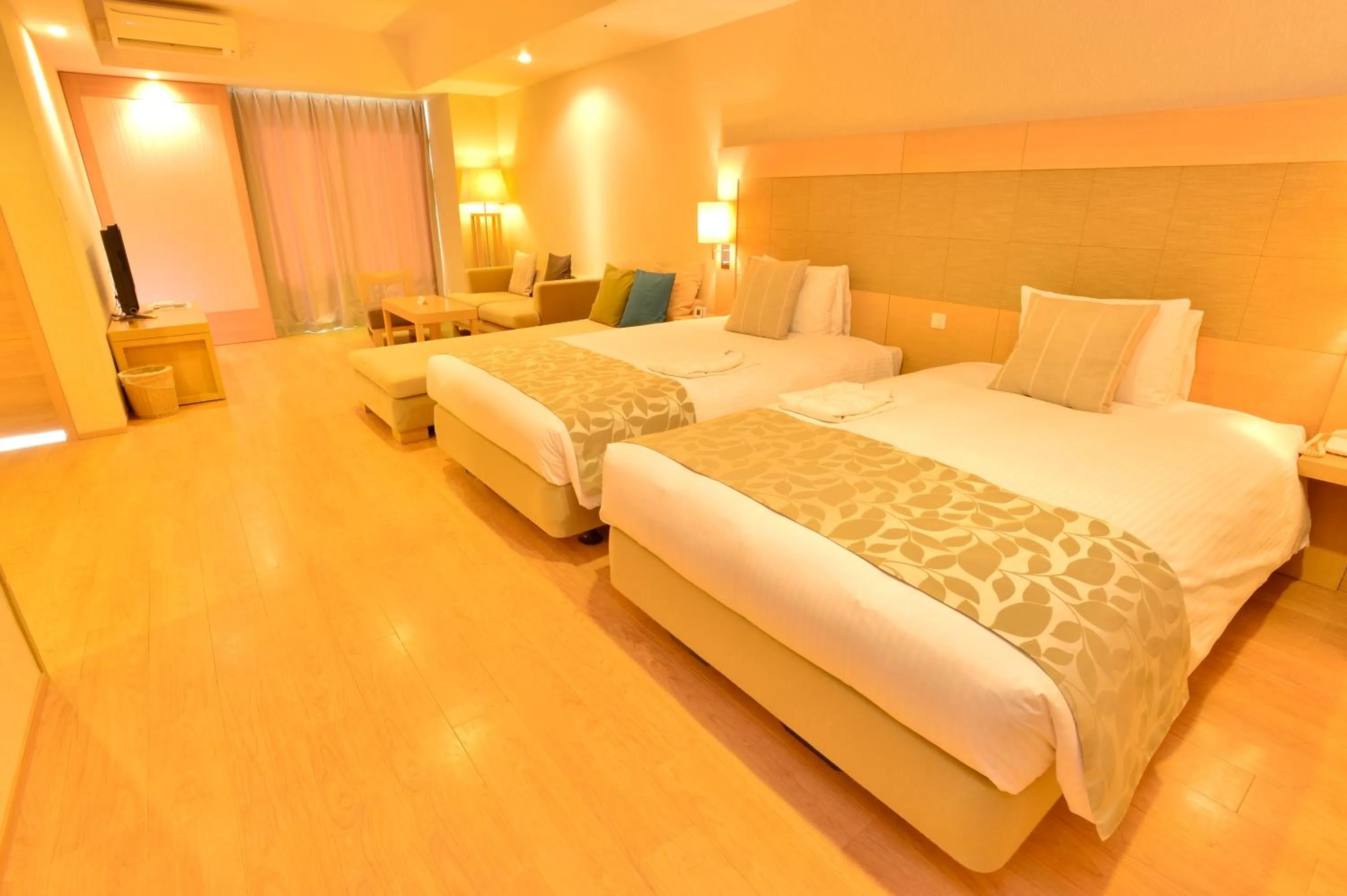 Bed in Moon Ocean Ginowan Hotel & Residence