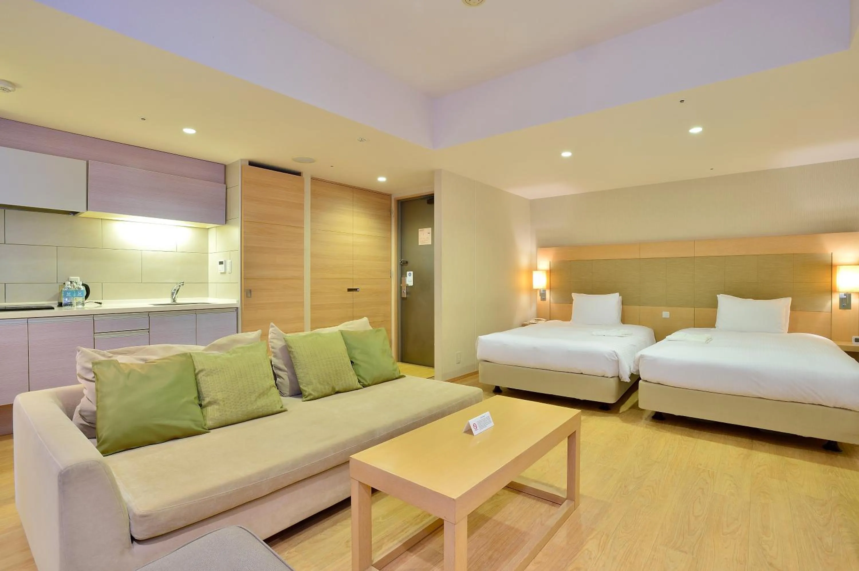 Bed in Moon Ocean Ginowan Hotel & Residence