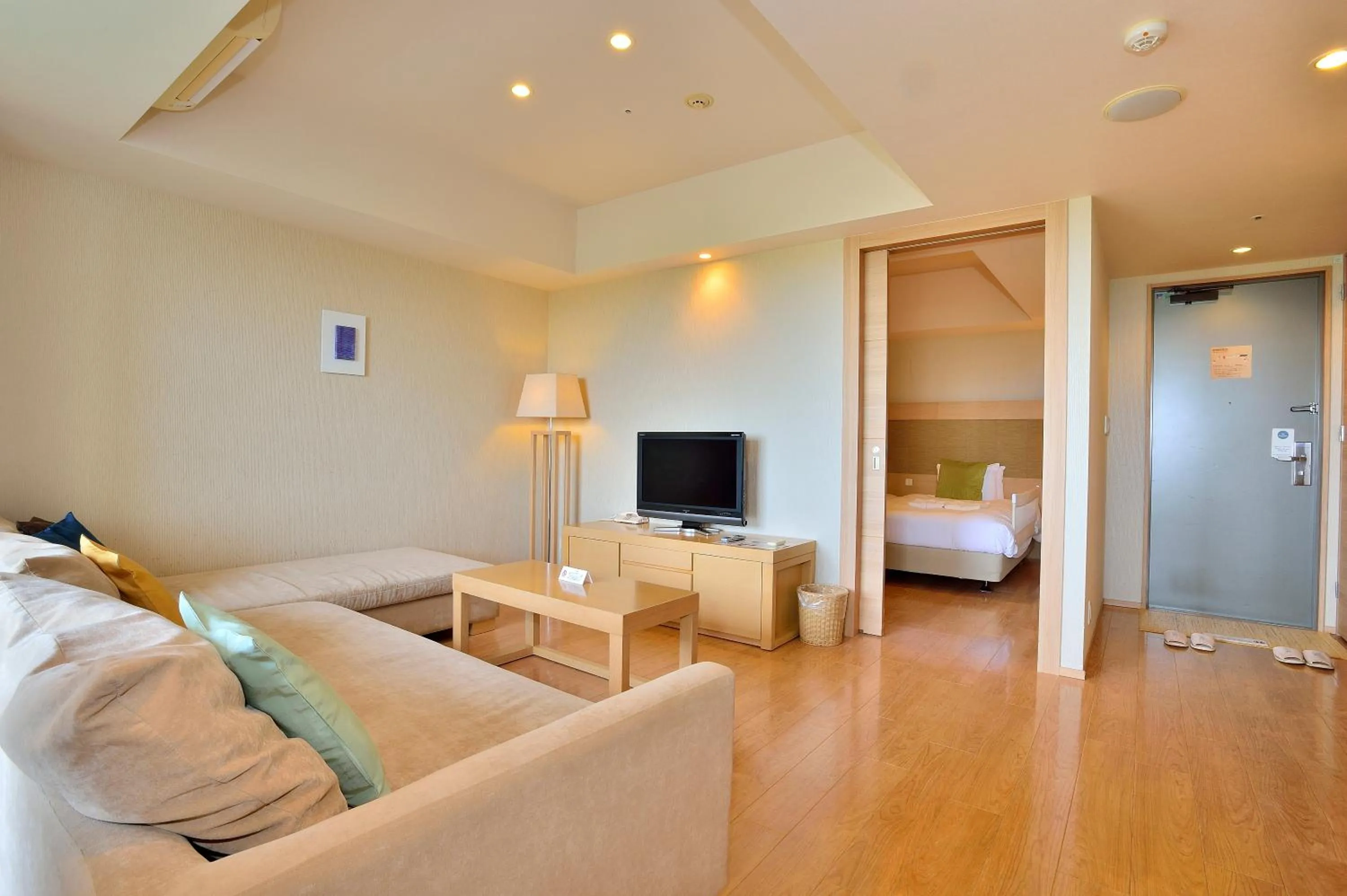 Living room, Bed in Moon Ocean Ginowan Hotel & Residence