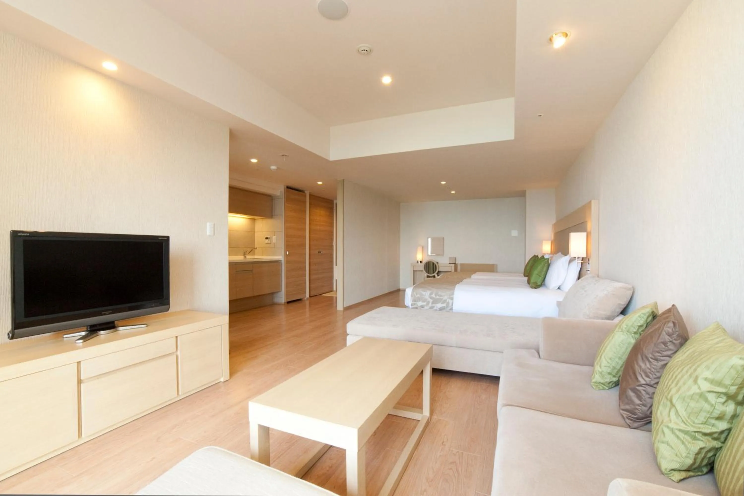 Living room, Bed in Moon Ocean Ginowan Hotel & Residence