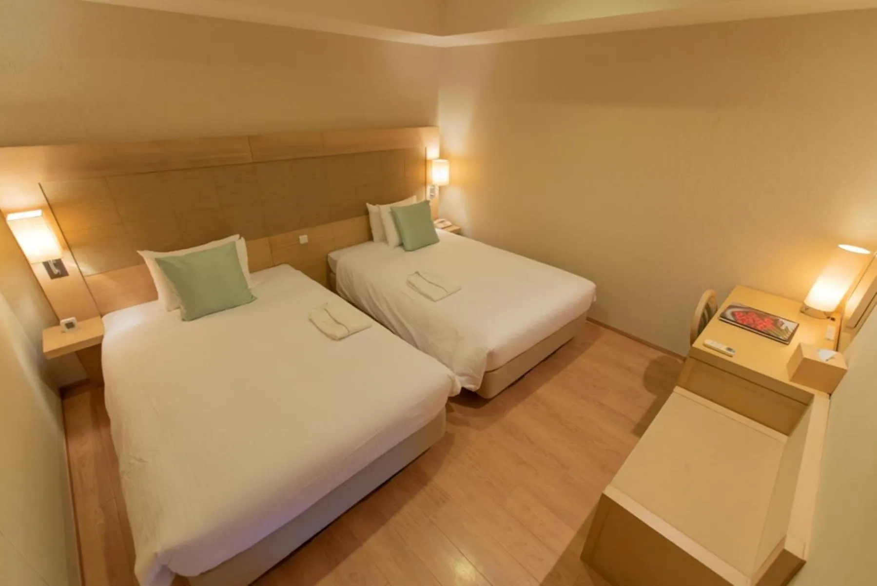 Bed in Moon Ocean Ginowan Hotel & Residence