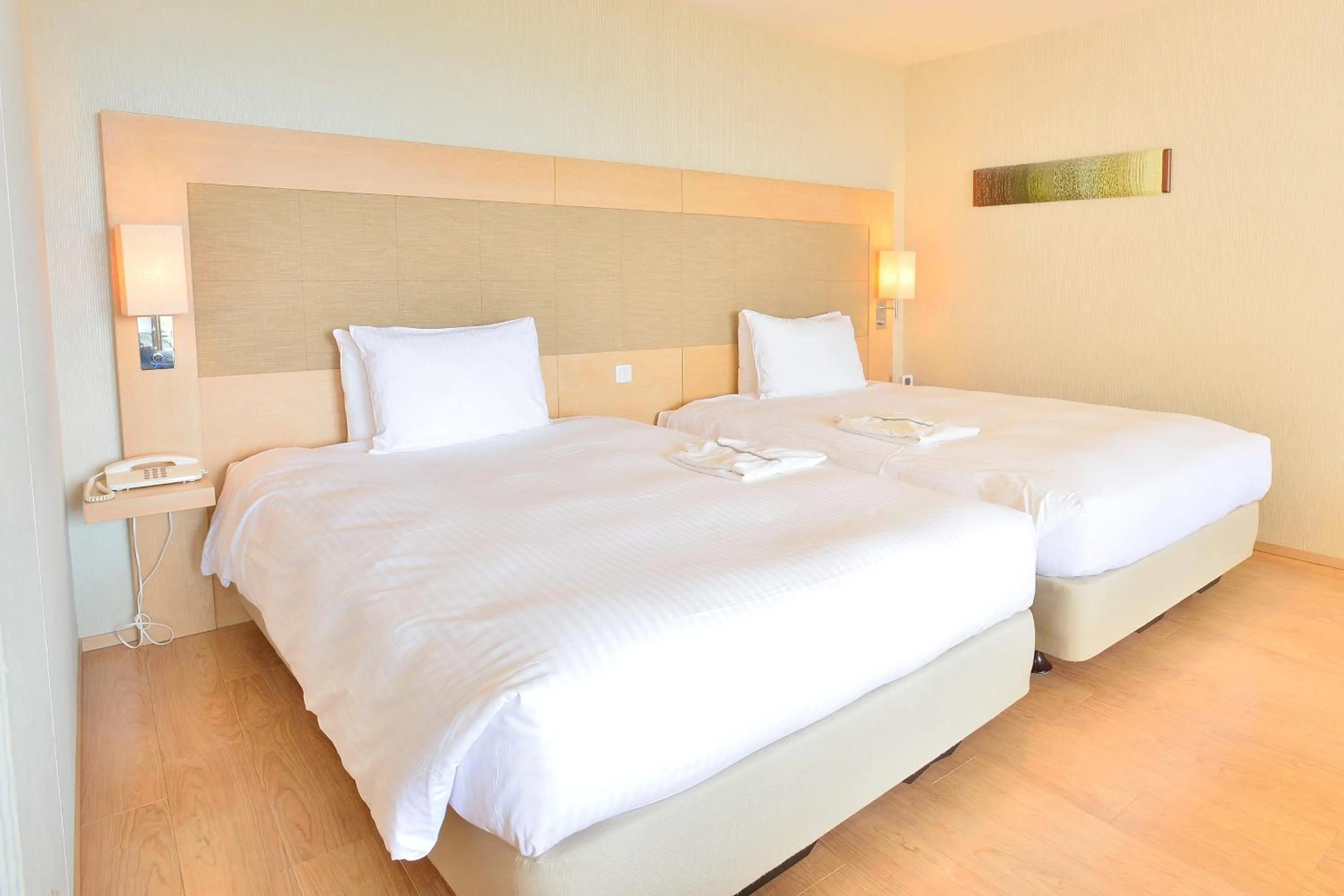 Bed in Moon Ocean Ginowan Hotel & Residence
