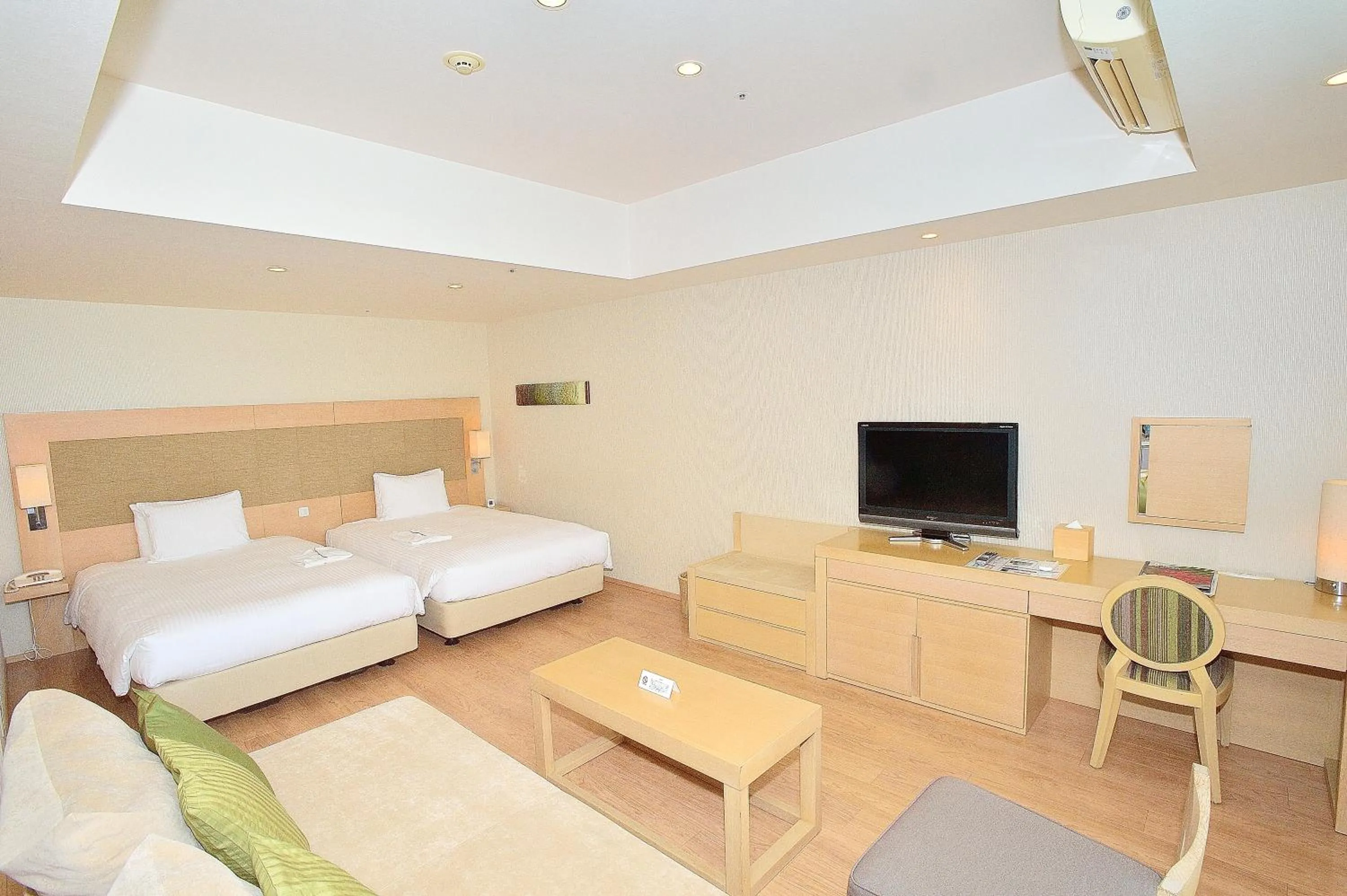 Bed in Moon Ocean Ginowan Hotel & Residence