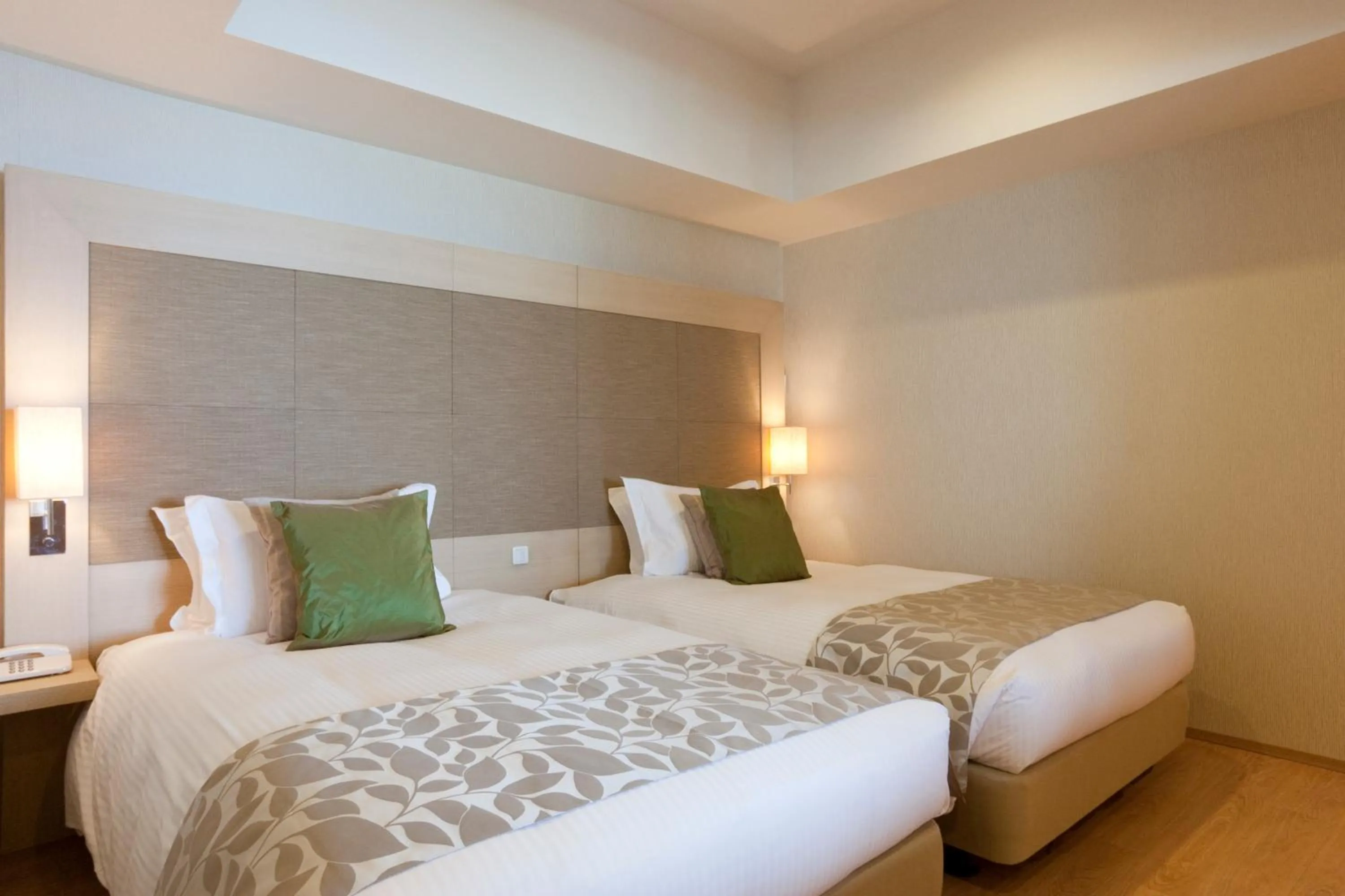 Bed in Moon Ocean Ginowan Hotel & Residence