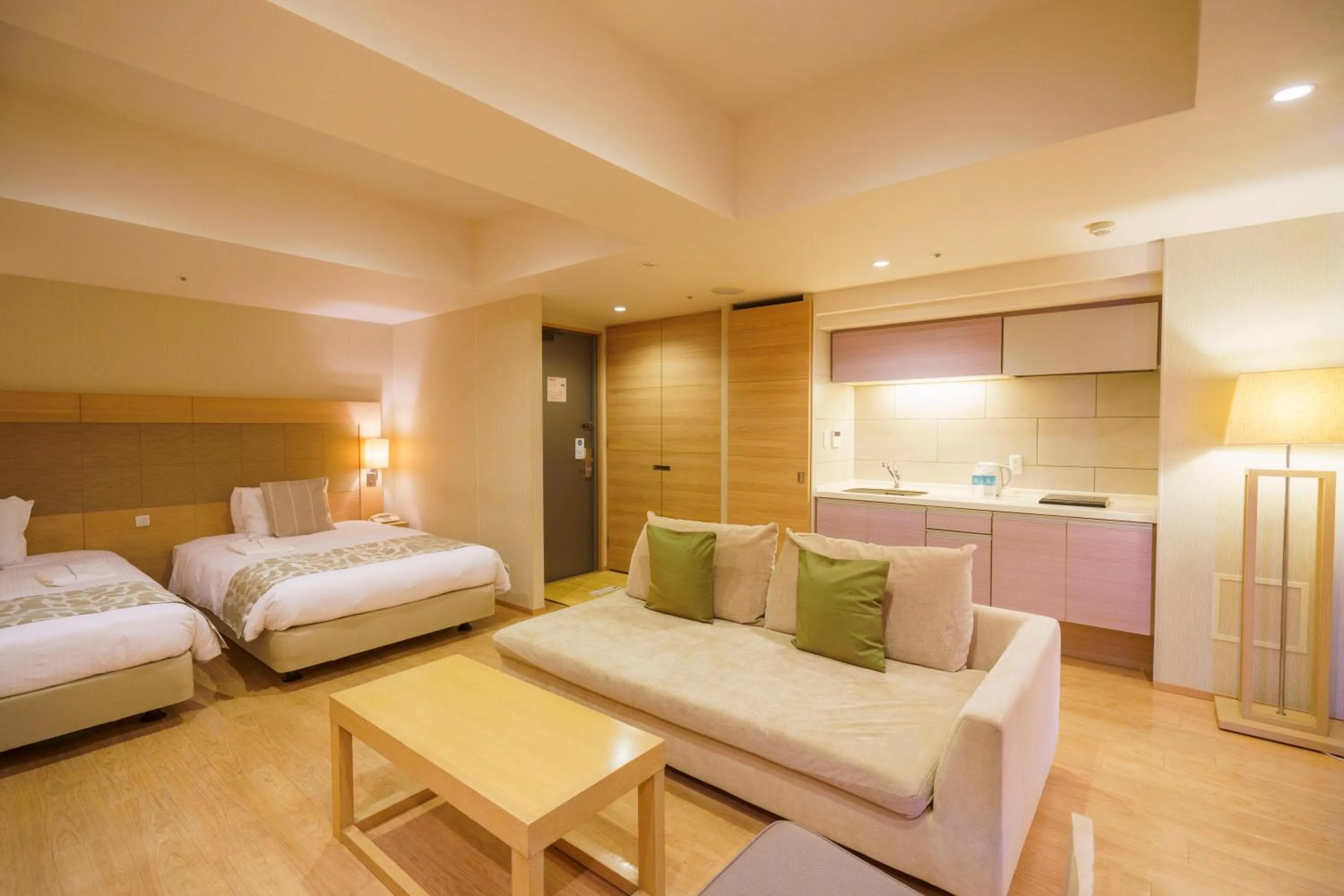 Bed in Moon Ocean Ginowan Hotel & Residence