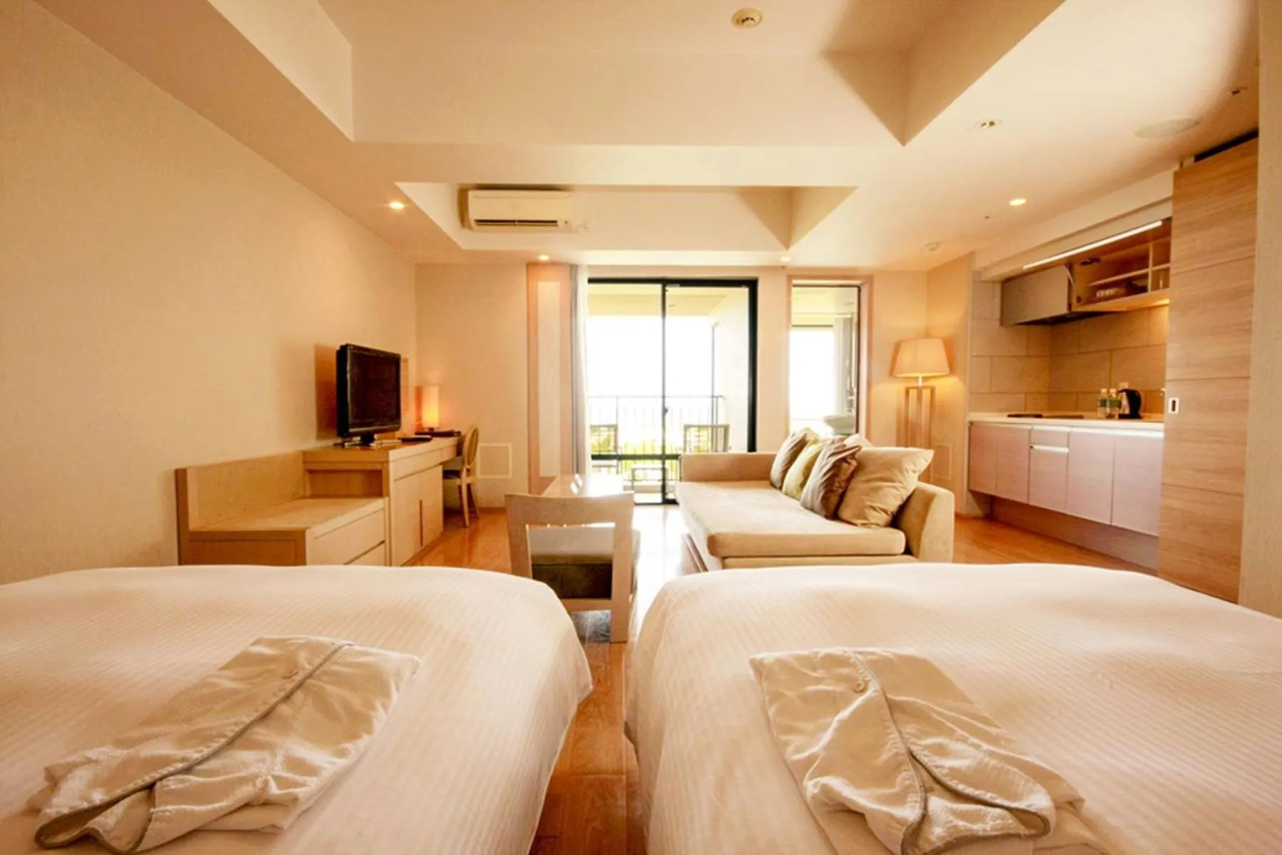 Bed in Moon Ocean Ginowan Hotel & Residence