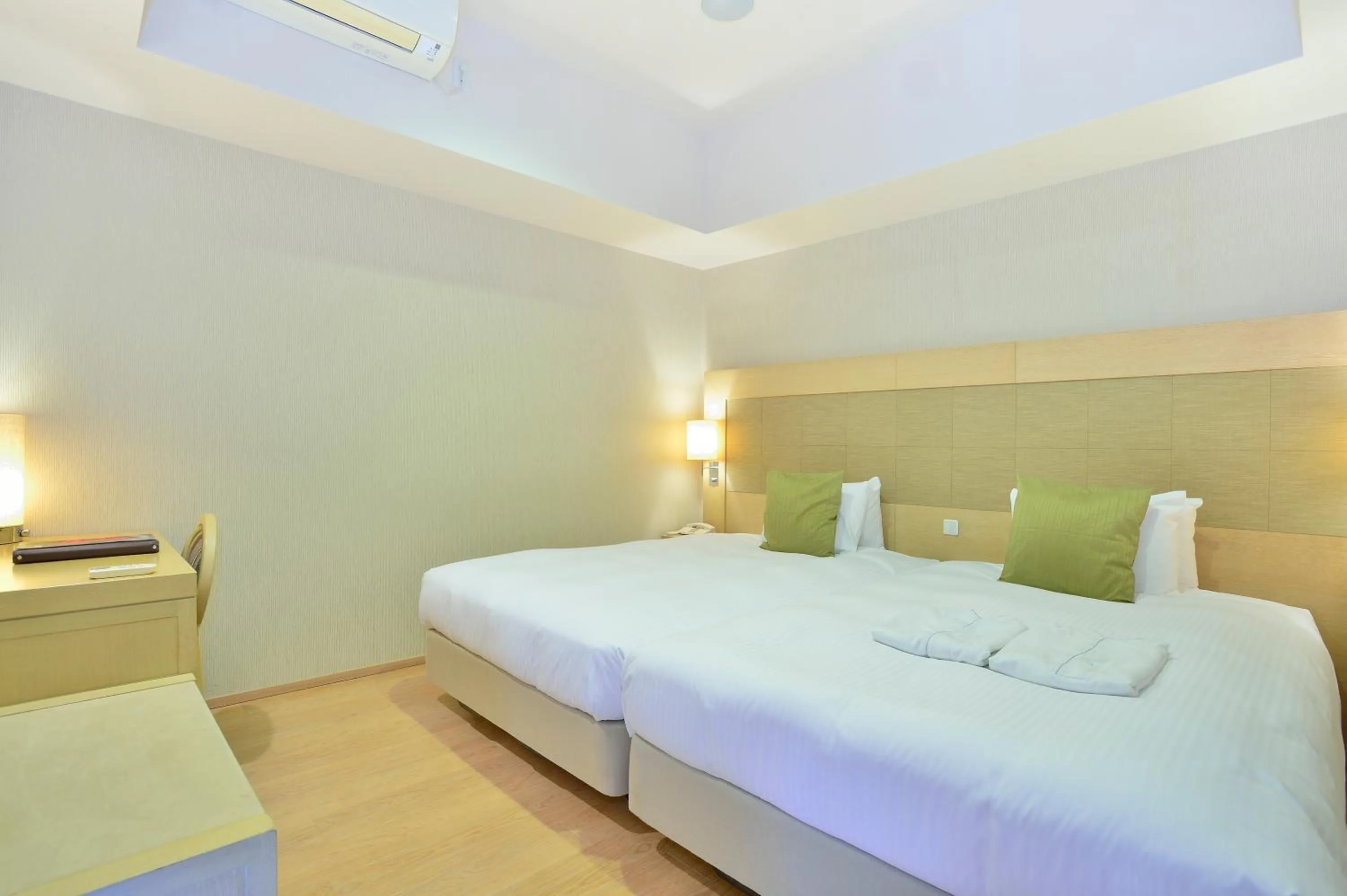 Bed in Moon Ocean Ginowan Hotel & Residence
