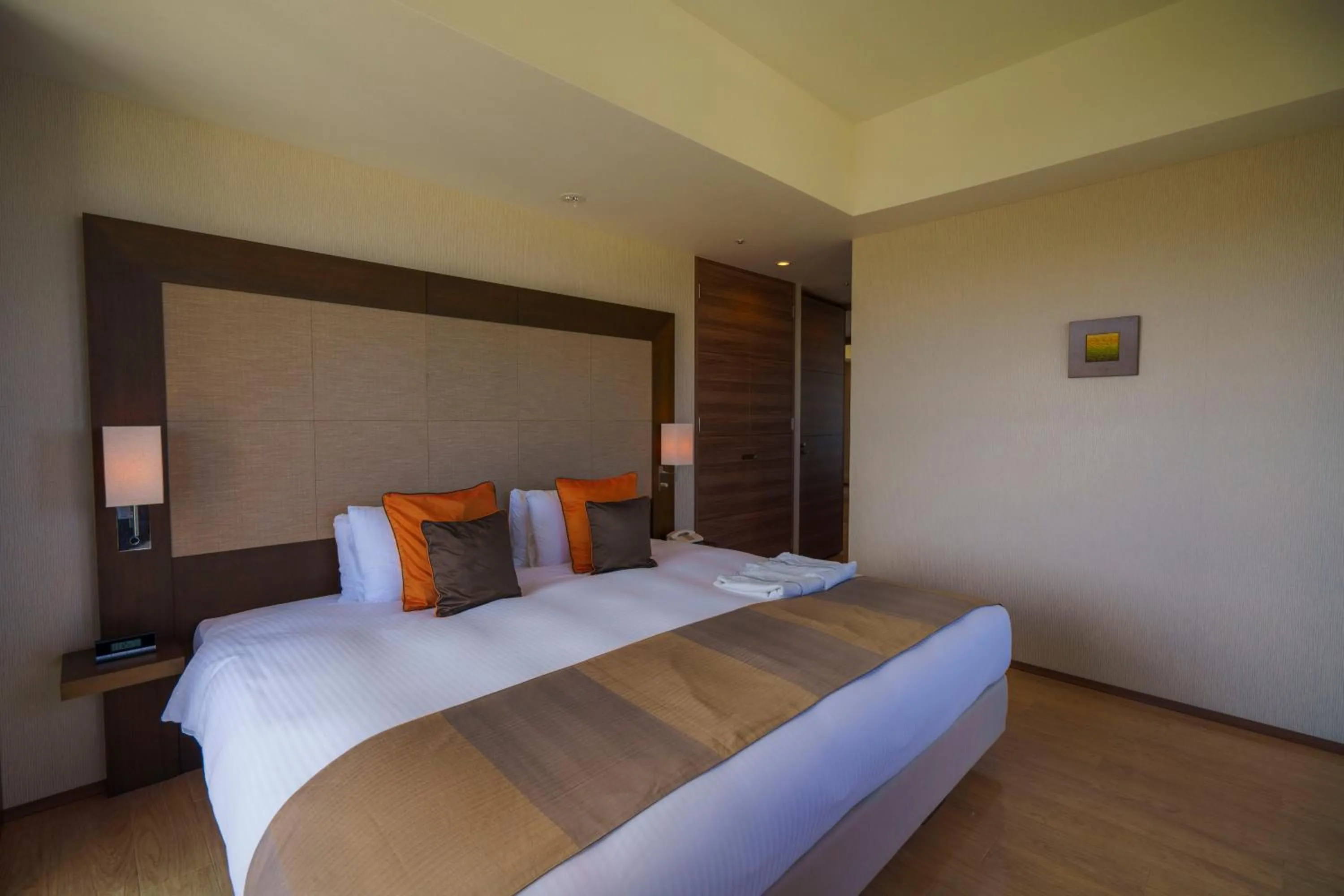 Bed in Moon Ocean Ginowan Hotel & Residence