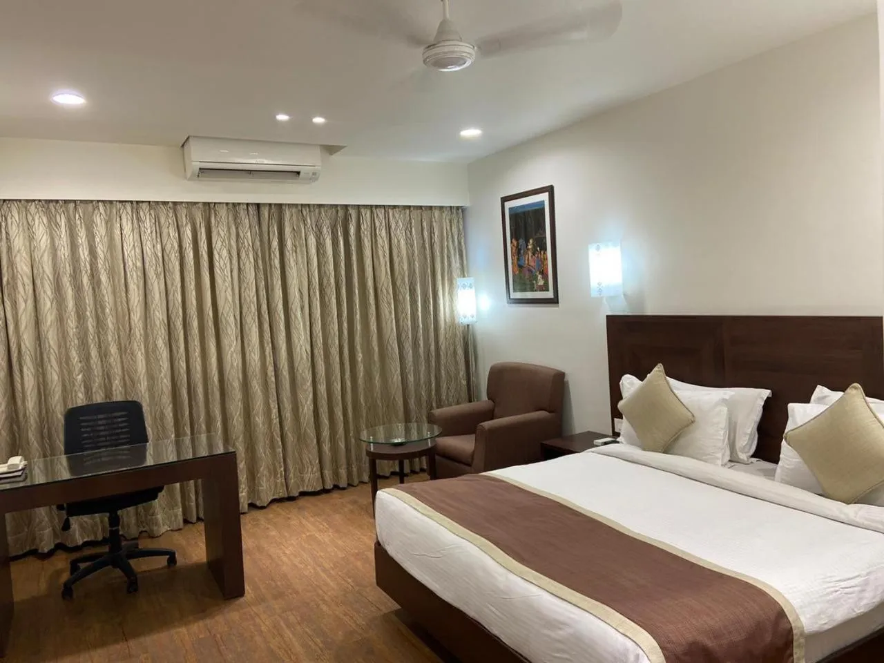 Bed in Chryso Hotels Pvt Ltd