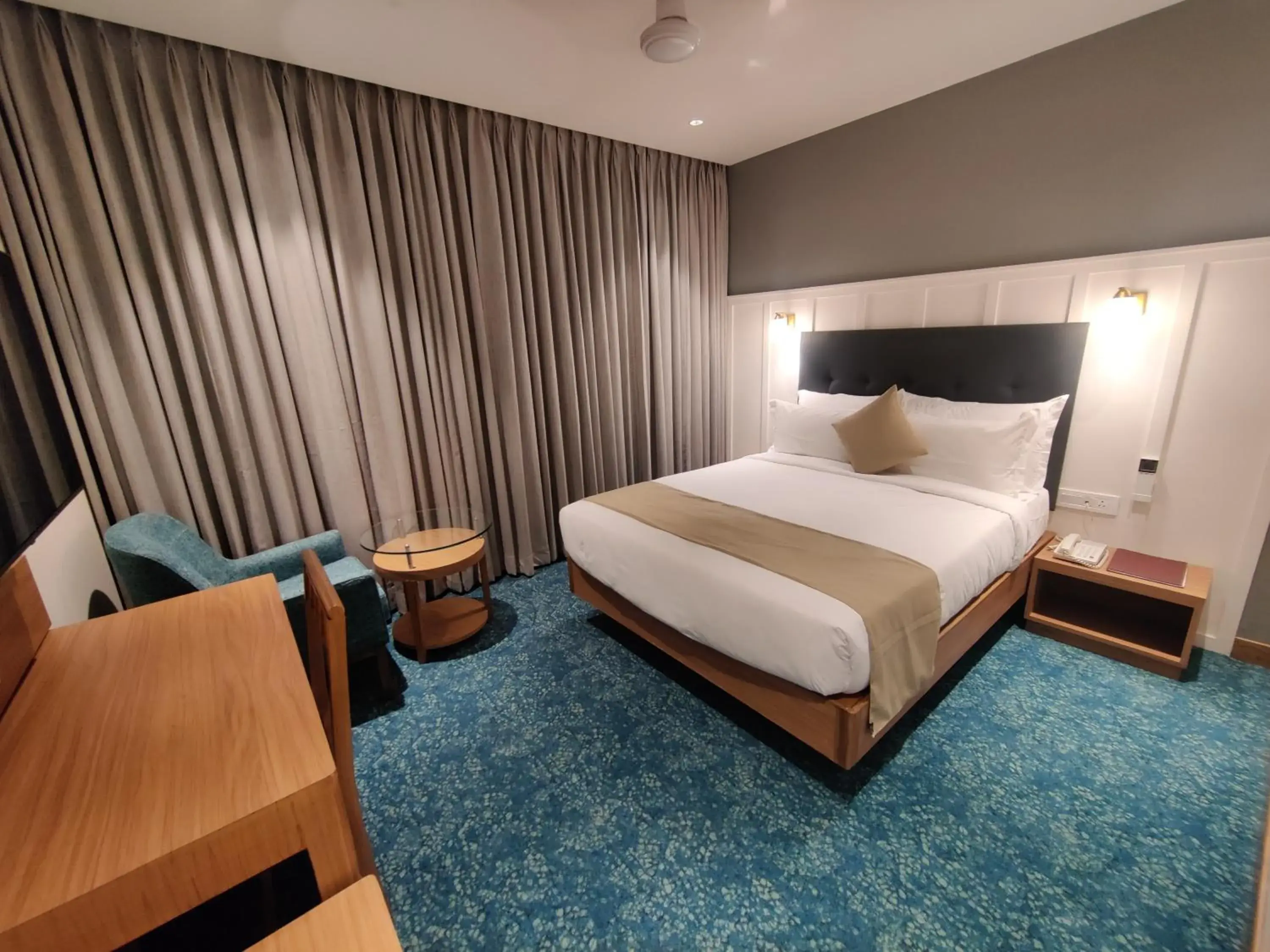 Photo of the whole room, Bed in Chryso Hotels Pvt Ltd Photo of the whole room, Bed in Chryso Hotels Pvt Ltd