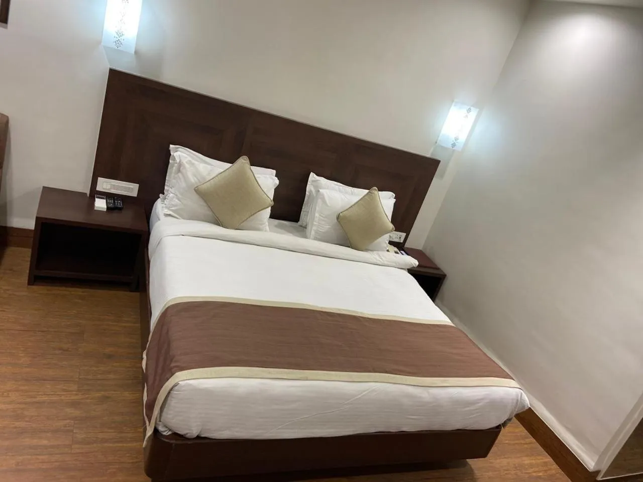 Bed in Chryso Hotels Pvt Ltd