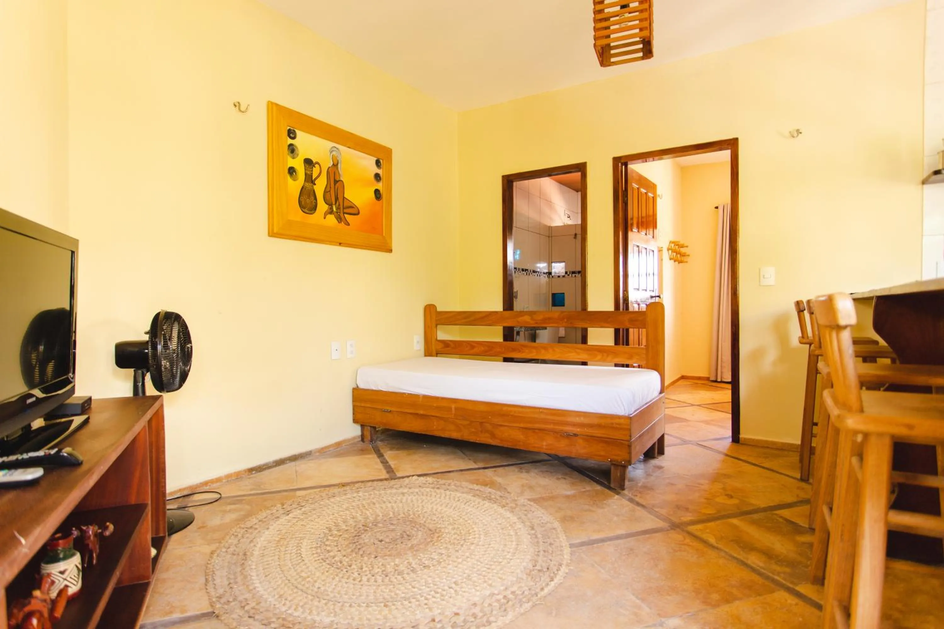 Living room, Bed in Pousada Dharma