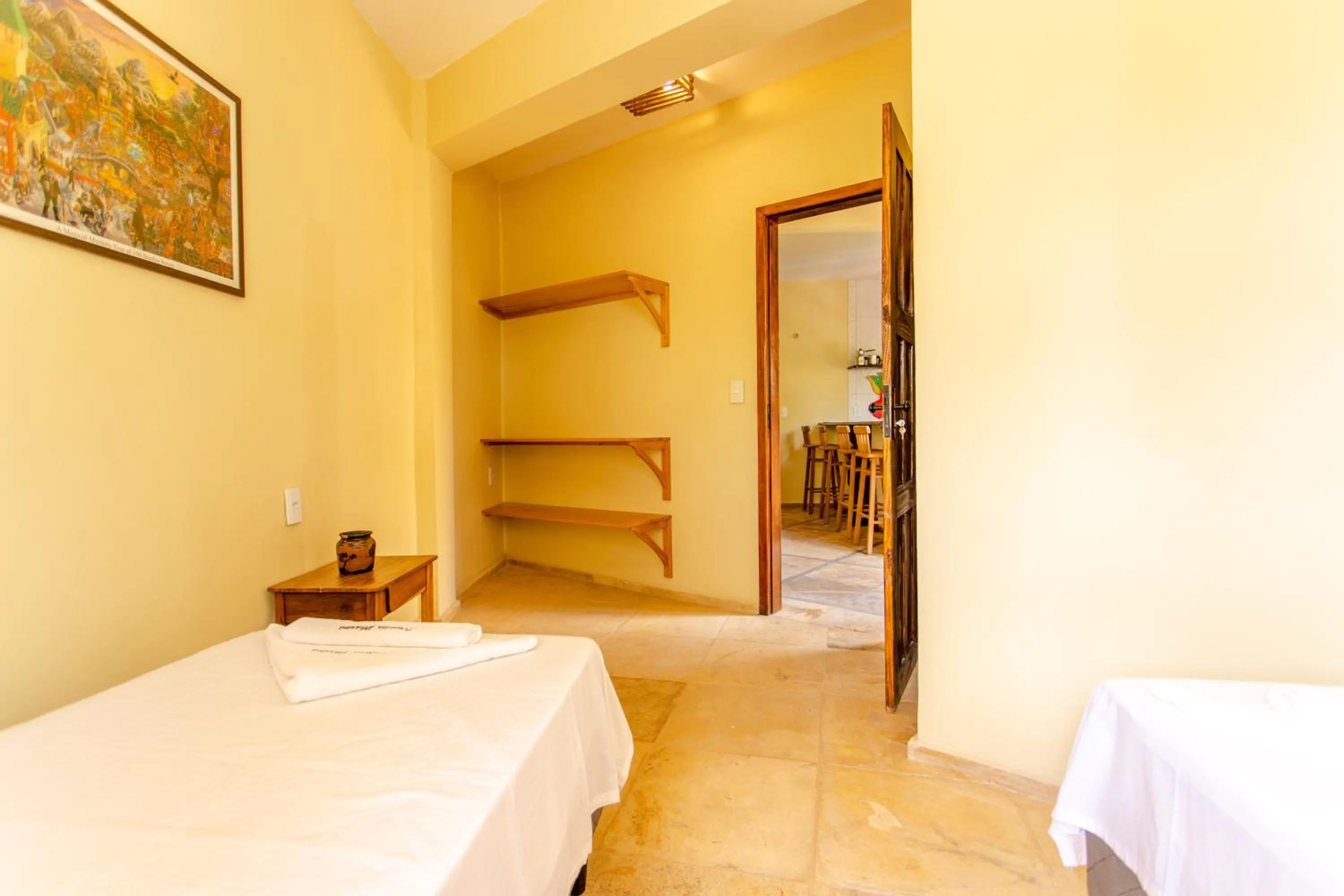 TV and multimedia, Bed in Pousada Dharma