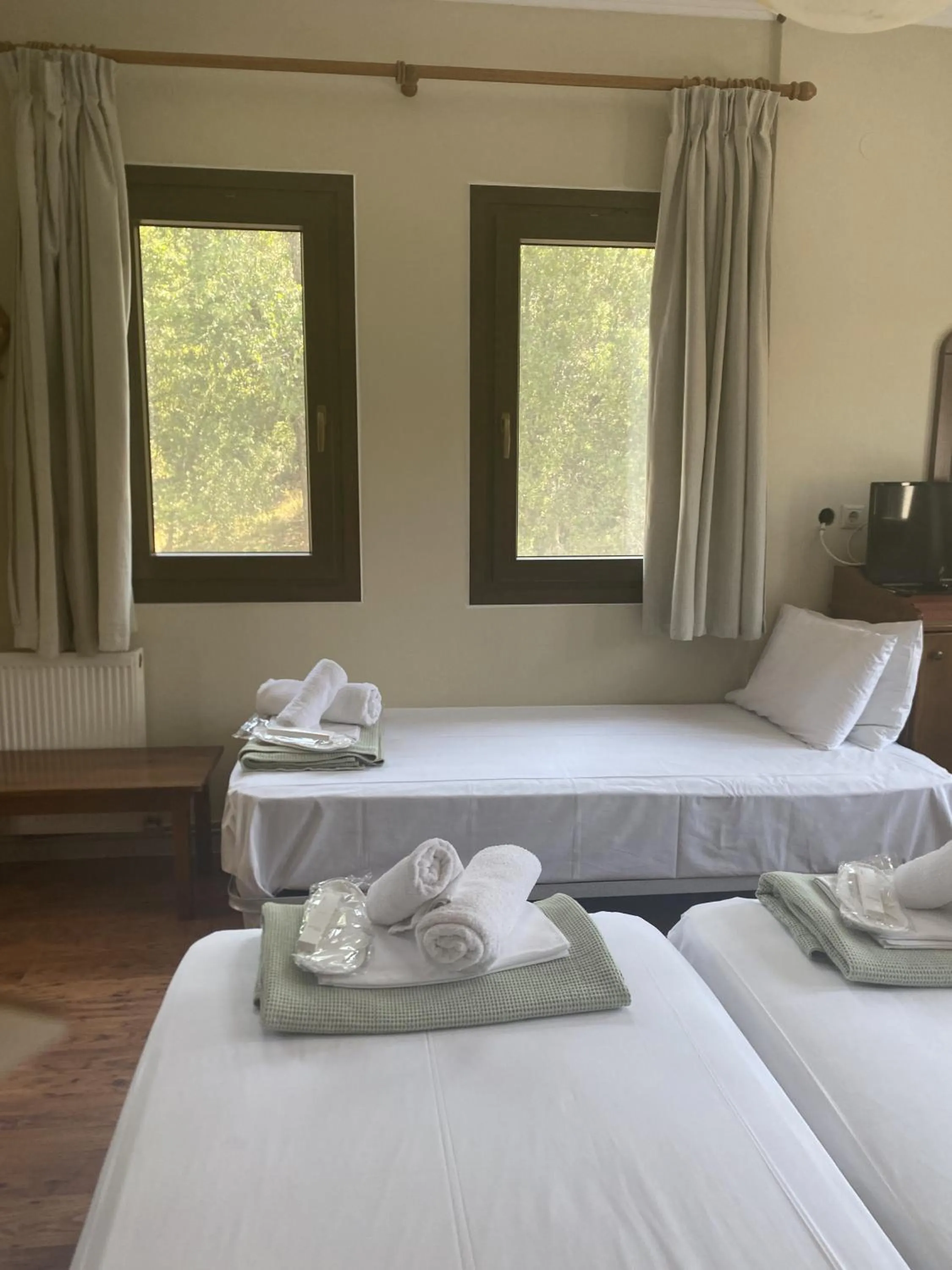 Bed in Agnanti Hotel