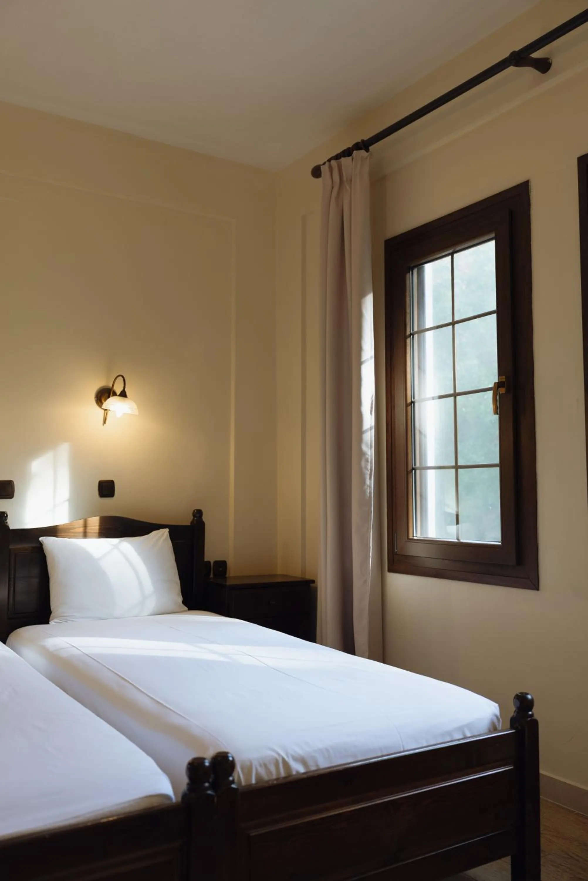 Bed in Agnanti Hotel