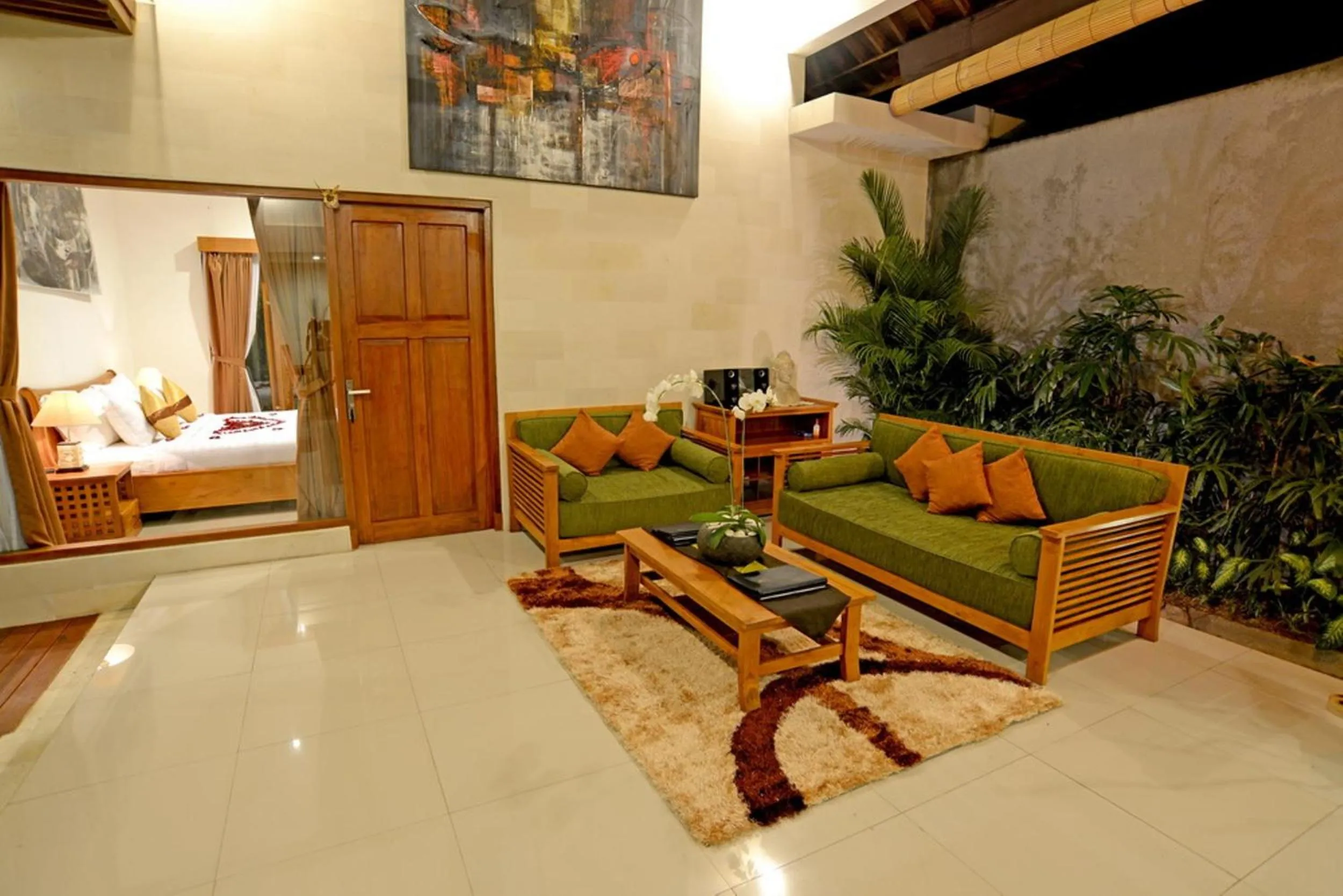 Living room, Bed in Sandi Agung Villa