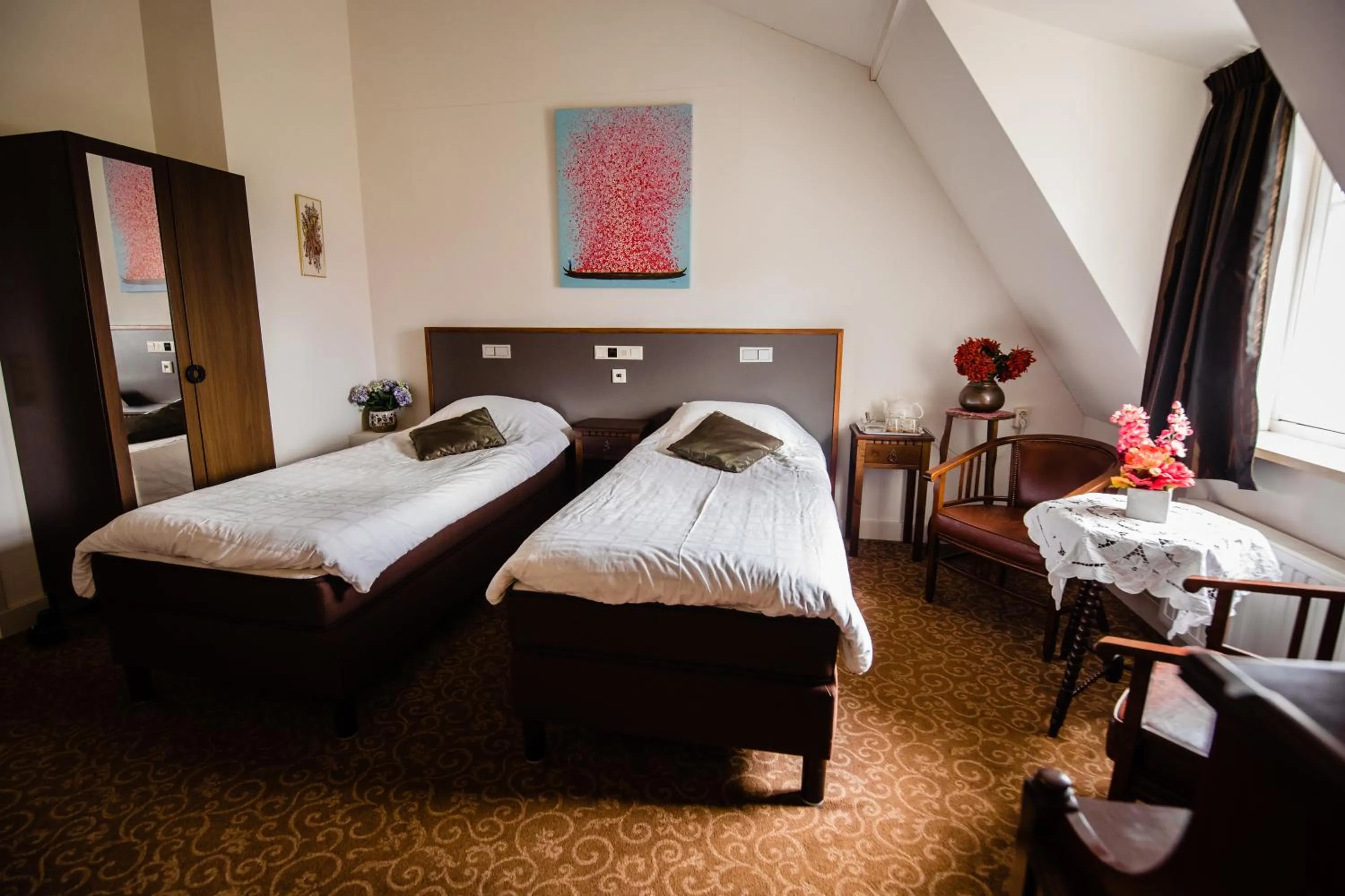 Bed in Hotel de Reiziger