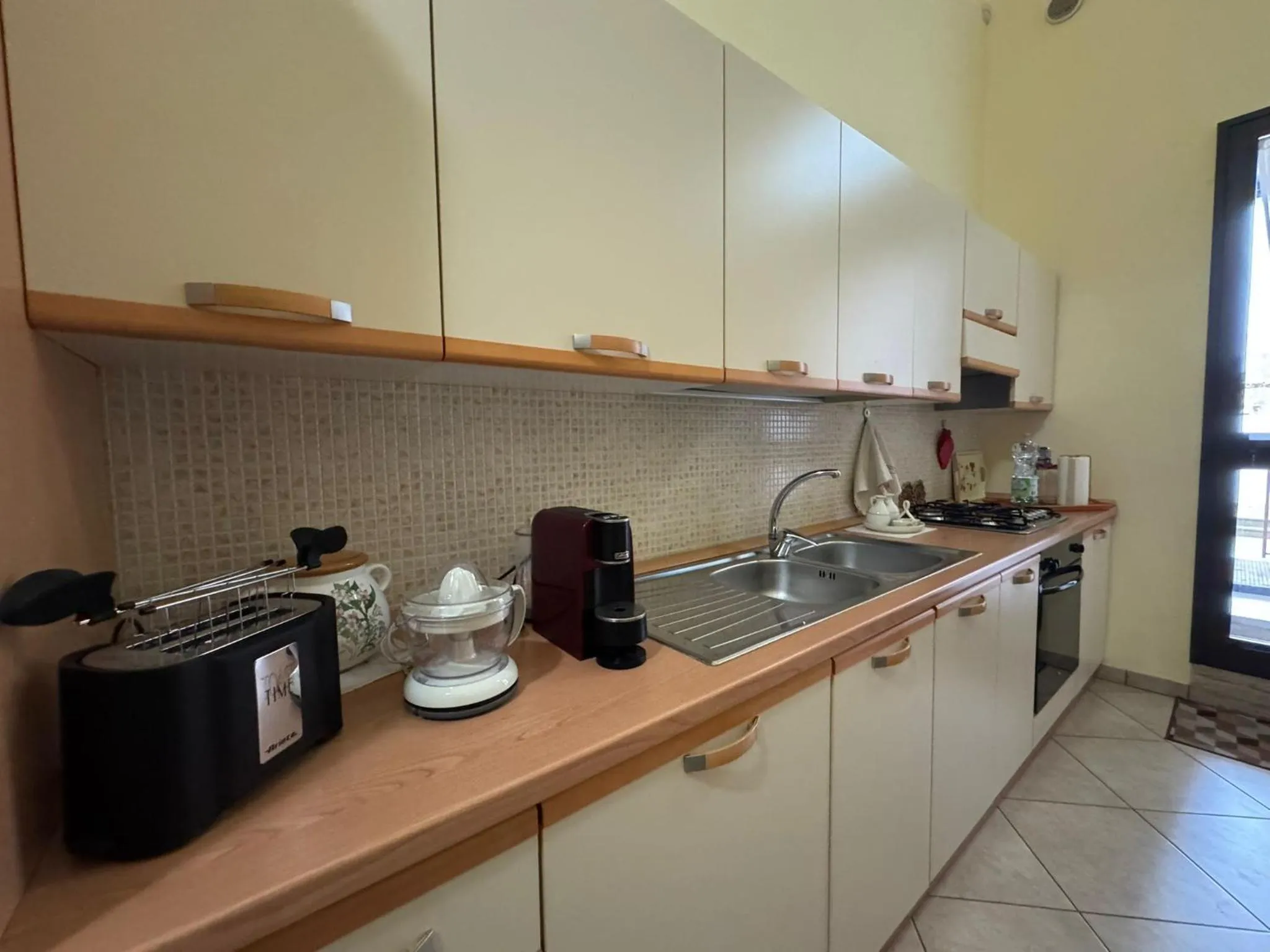 Communal kitchen in B&B La Corte