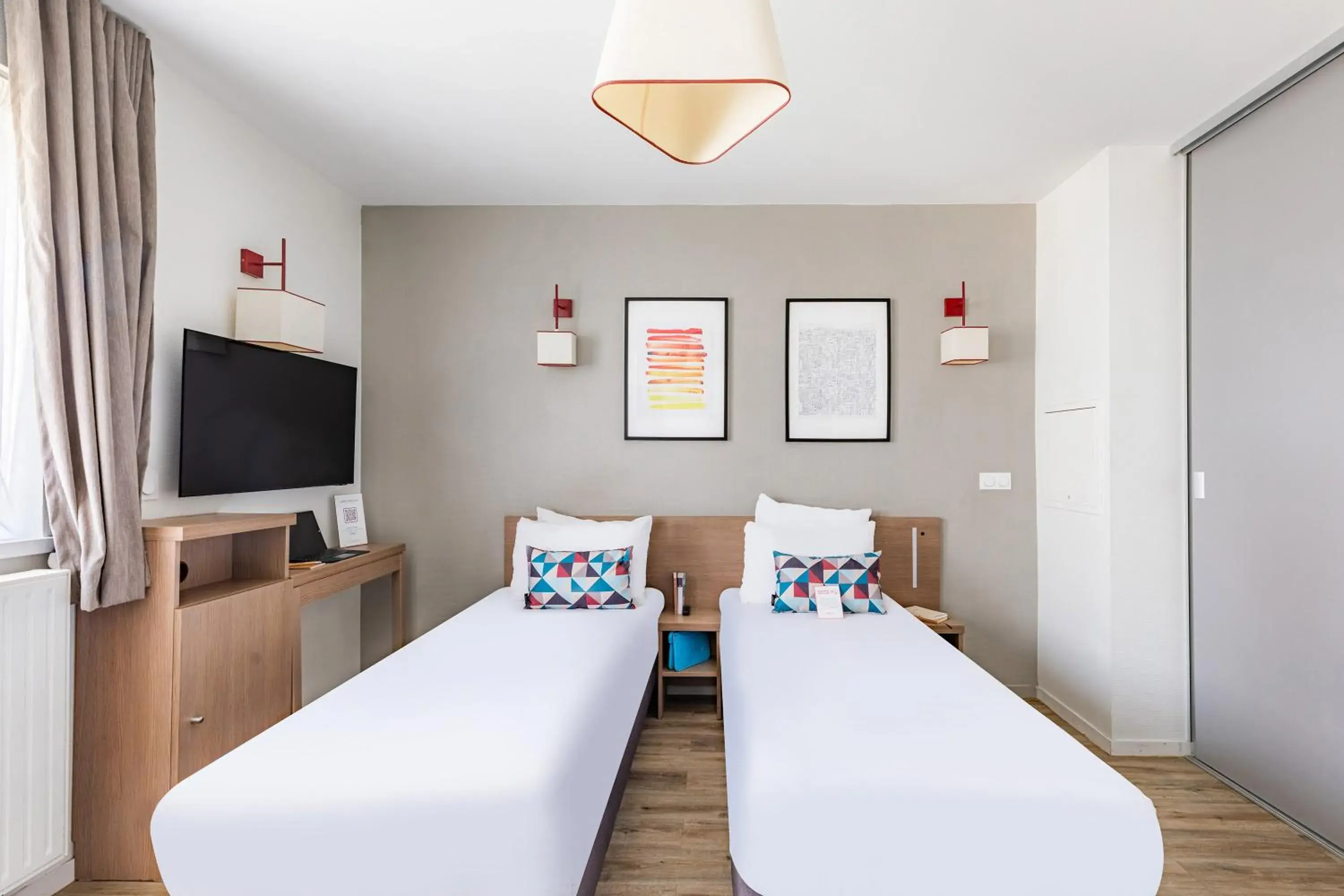 Bed in Appart'City Confort Orléans Bed in Appart'City Confort Orléans