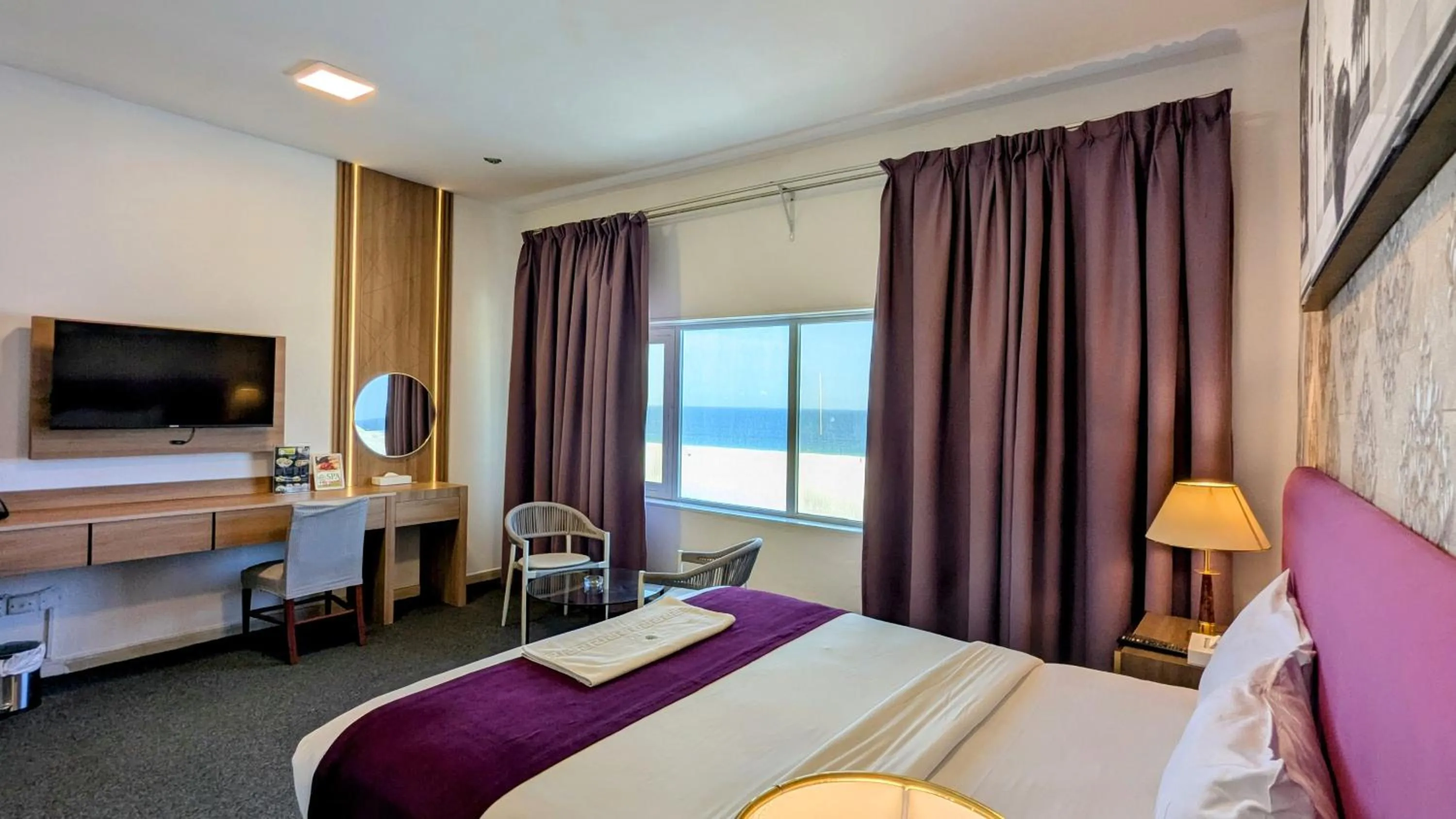 Bed in Mermaid Beach Hotel LLC