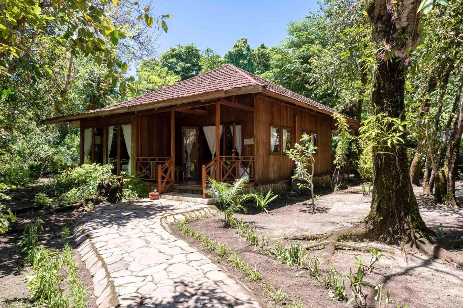 Patio, Property Building in Siladen Resort & Spa