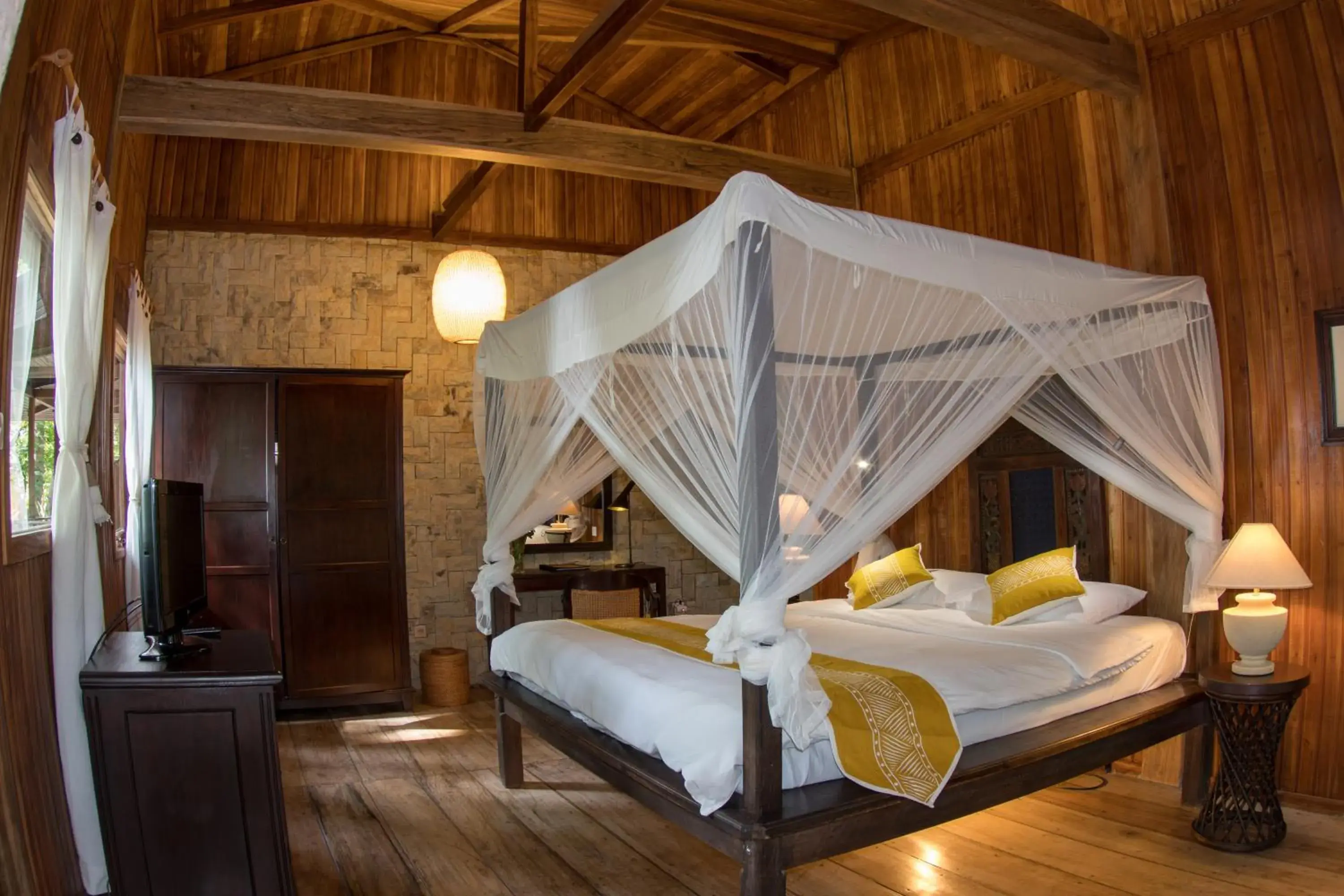 Bed in Siladen Resort & Spa