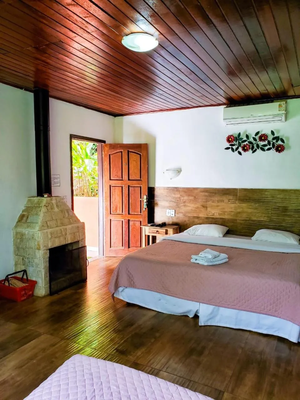 Bed in Pousada Mirante do Penedo