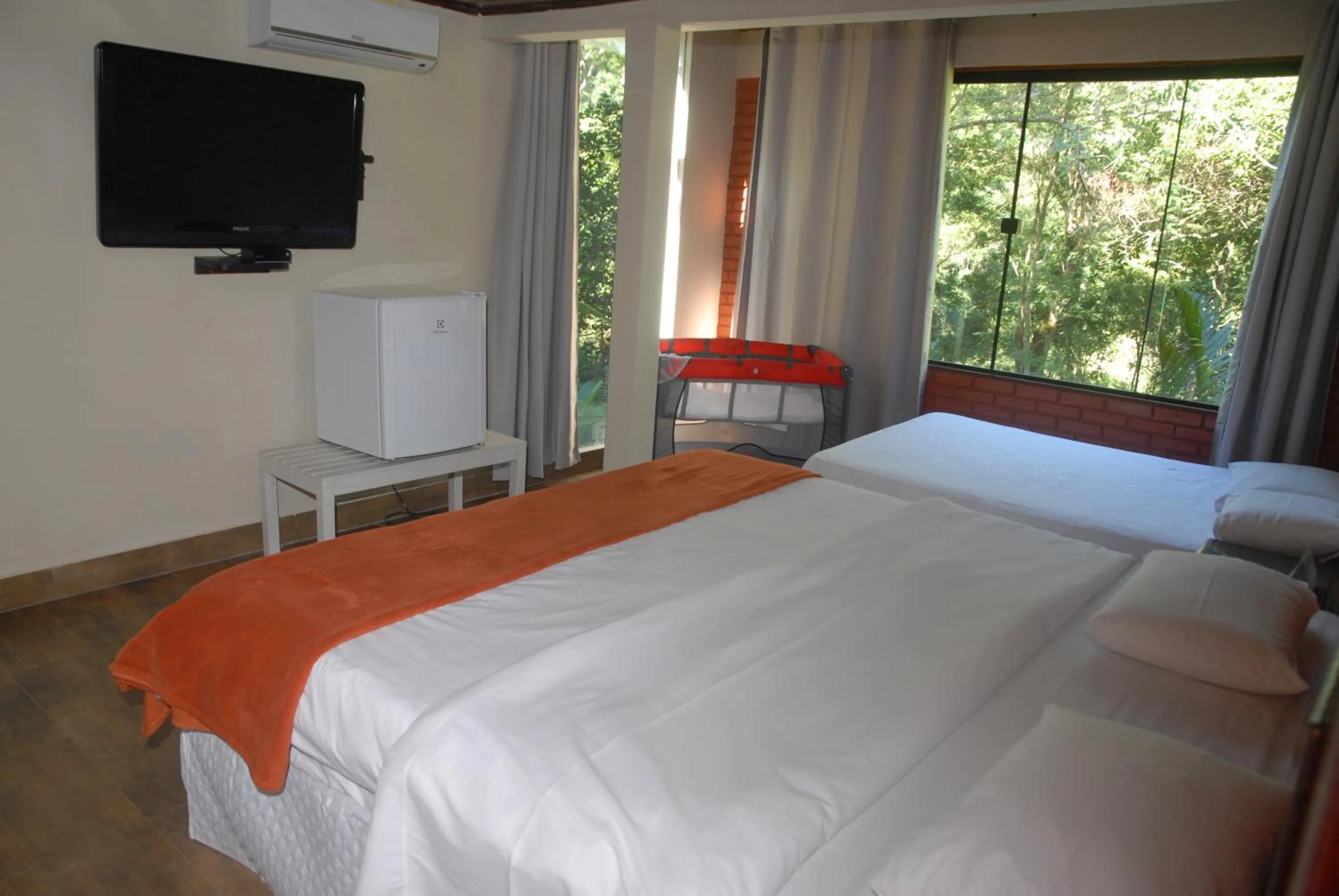 Bed in Pousada Mirante do Penedo