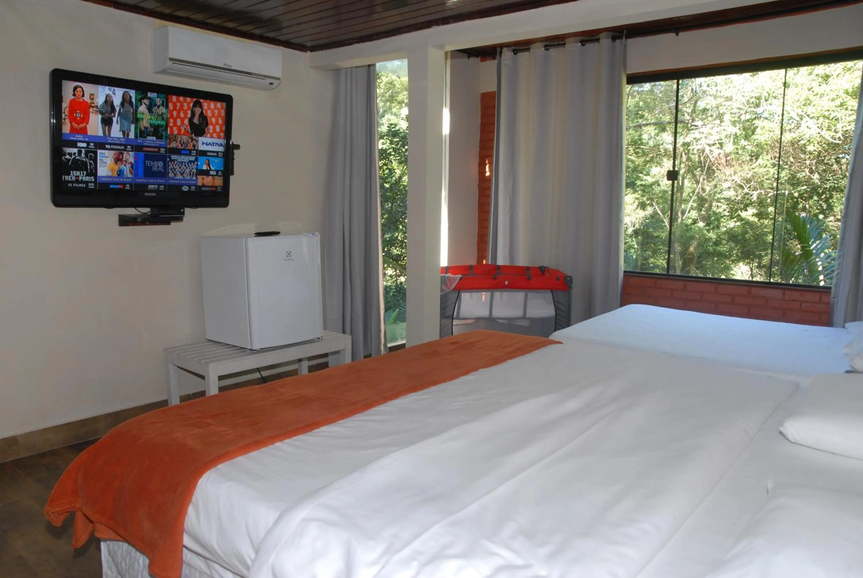 Bed in Pousada Mirante do Penedo