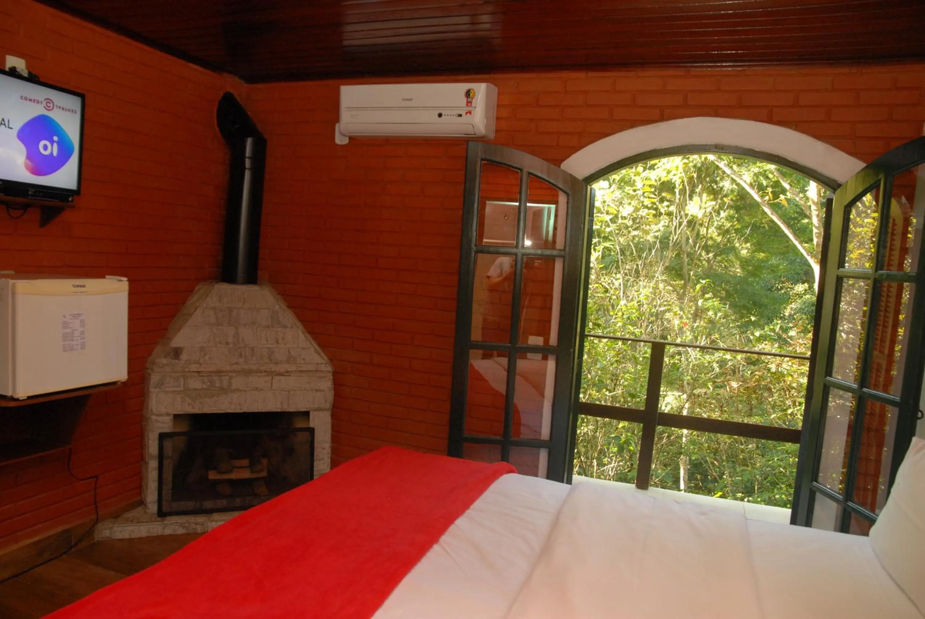 Bed in Pousada Mirante do Penedo