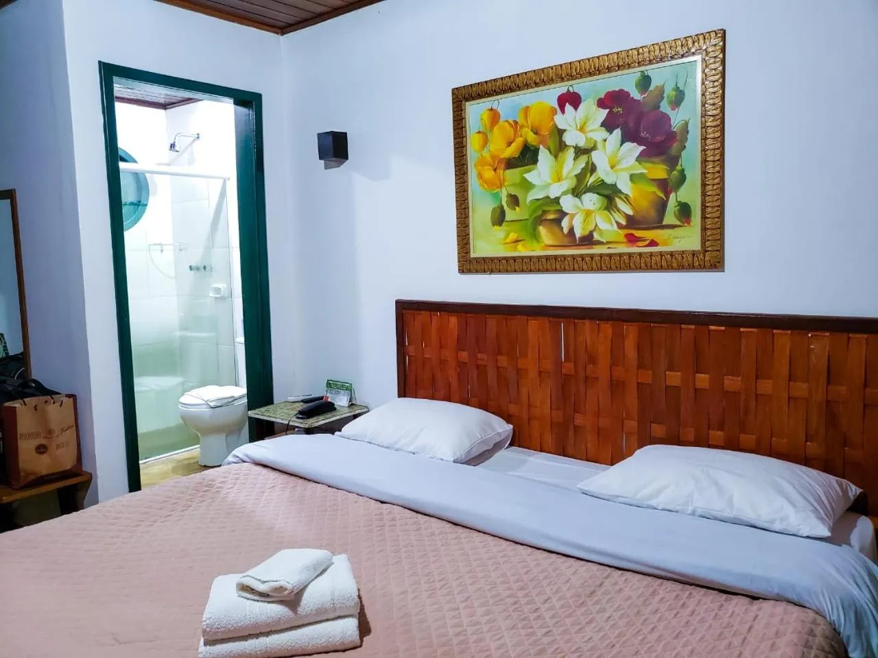 Bed in Pousada Mirante do Penedo