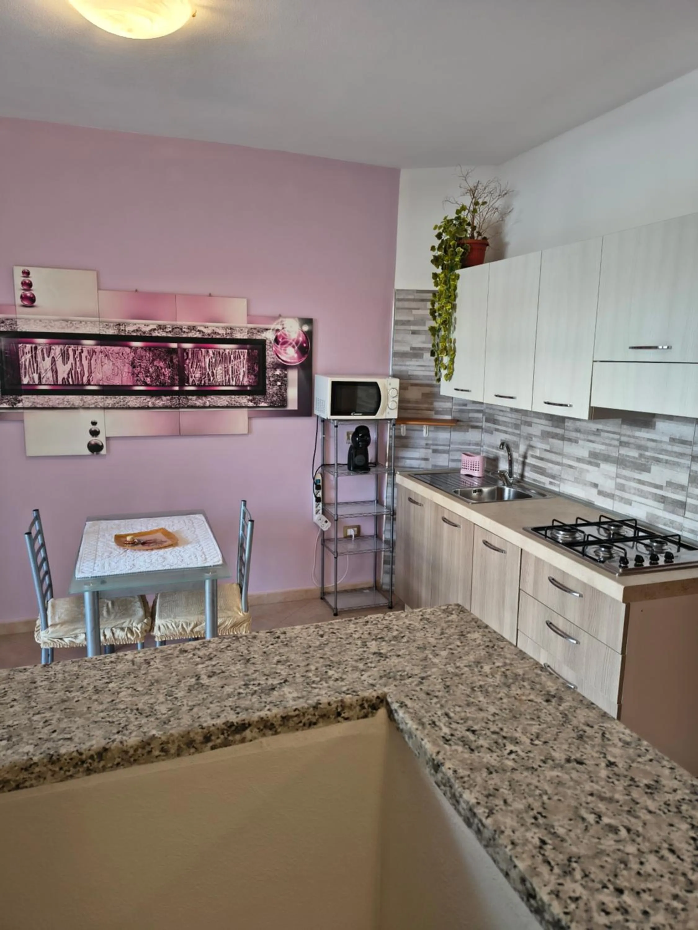 Kitchen or kitchenette in La Fortezza casa vacanze & appartament