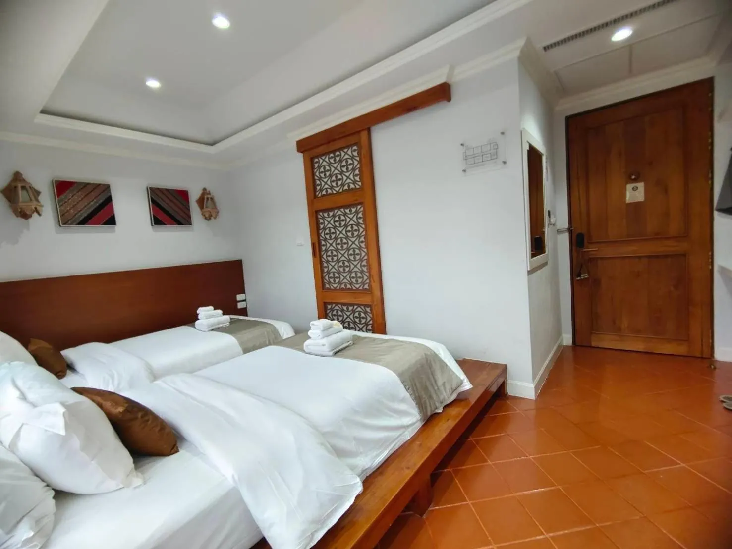 Bed in Lanna Oriental Hotel