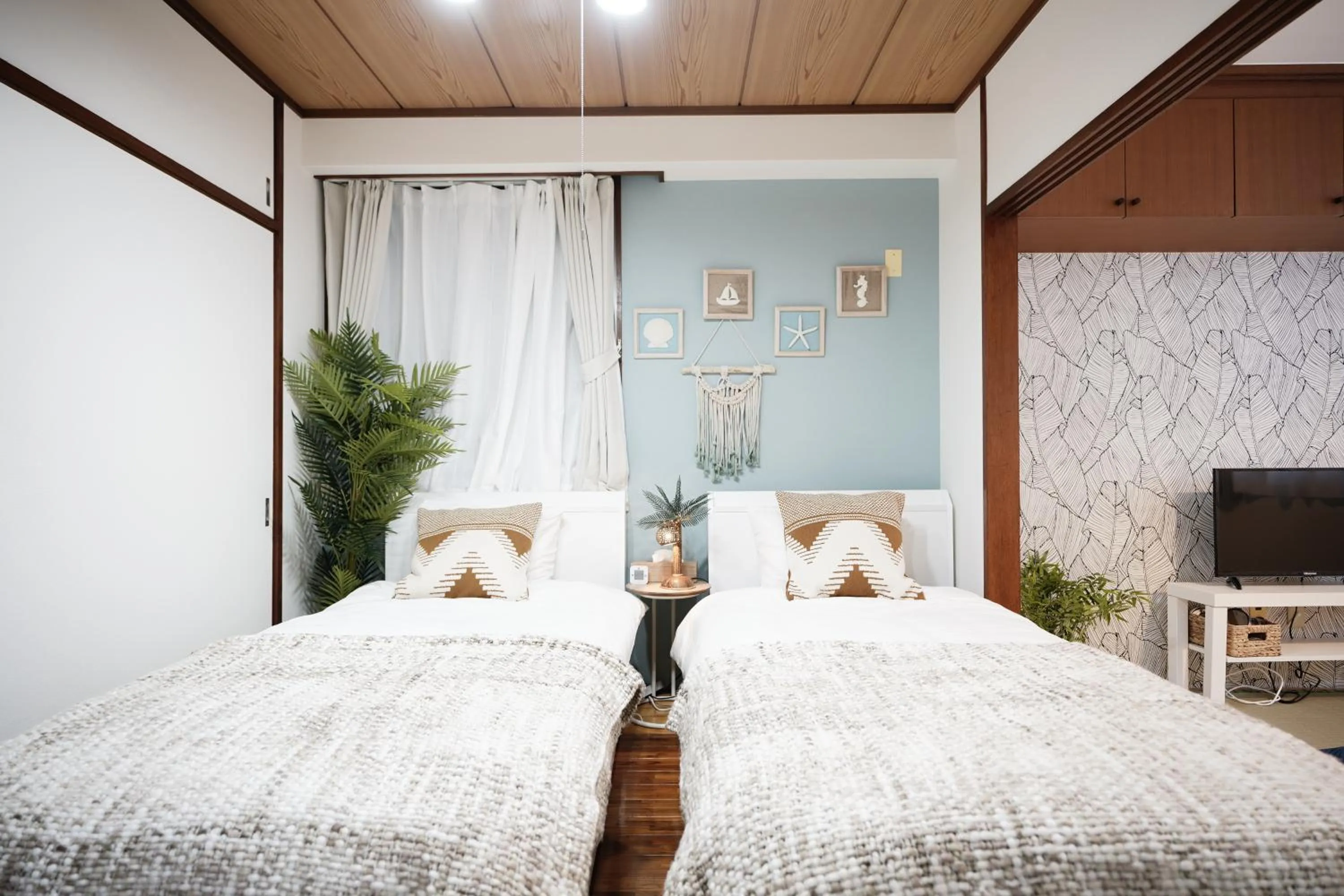 Bedroom, Bed in Naha Southerlies Condominium Kumoji