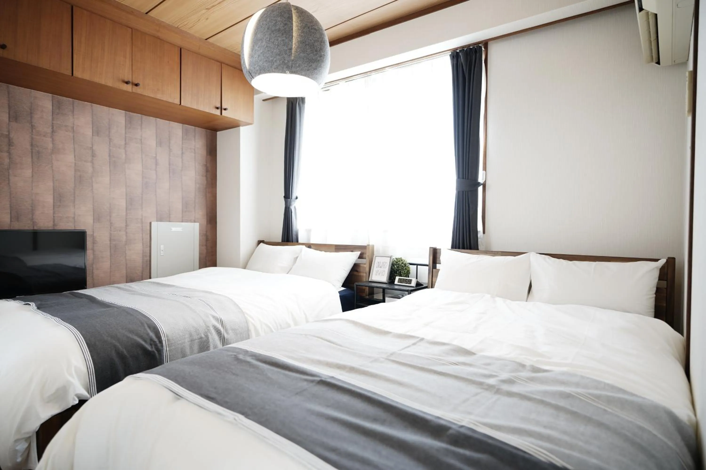 Bedroom, Bed in Naha Southerlies Condominium Kumoji