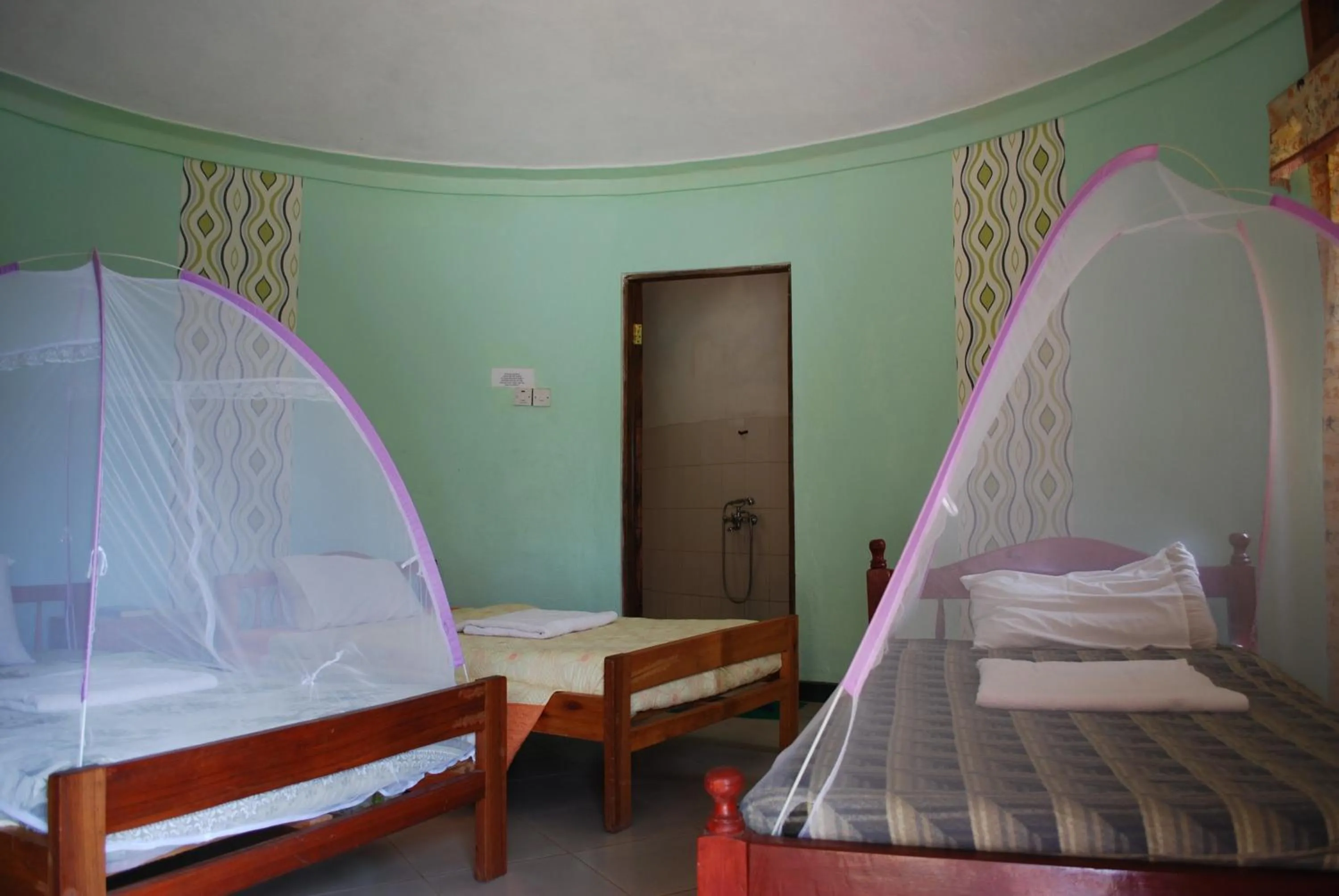 Bed in Crater Bay Cottages