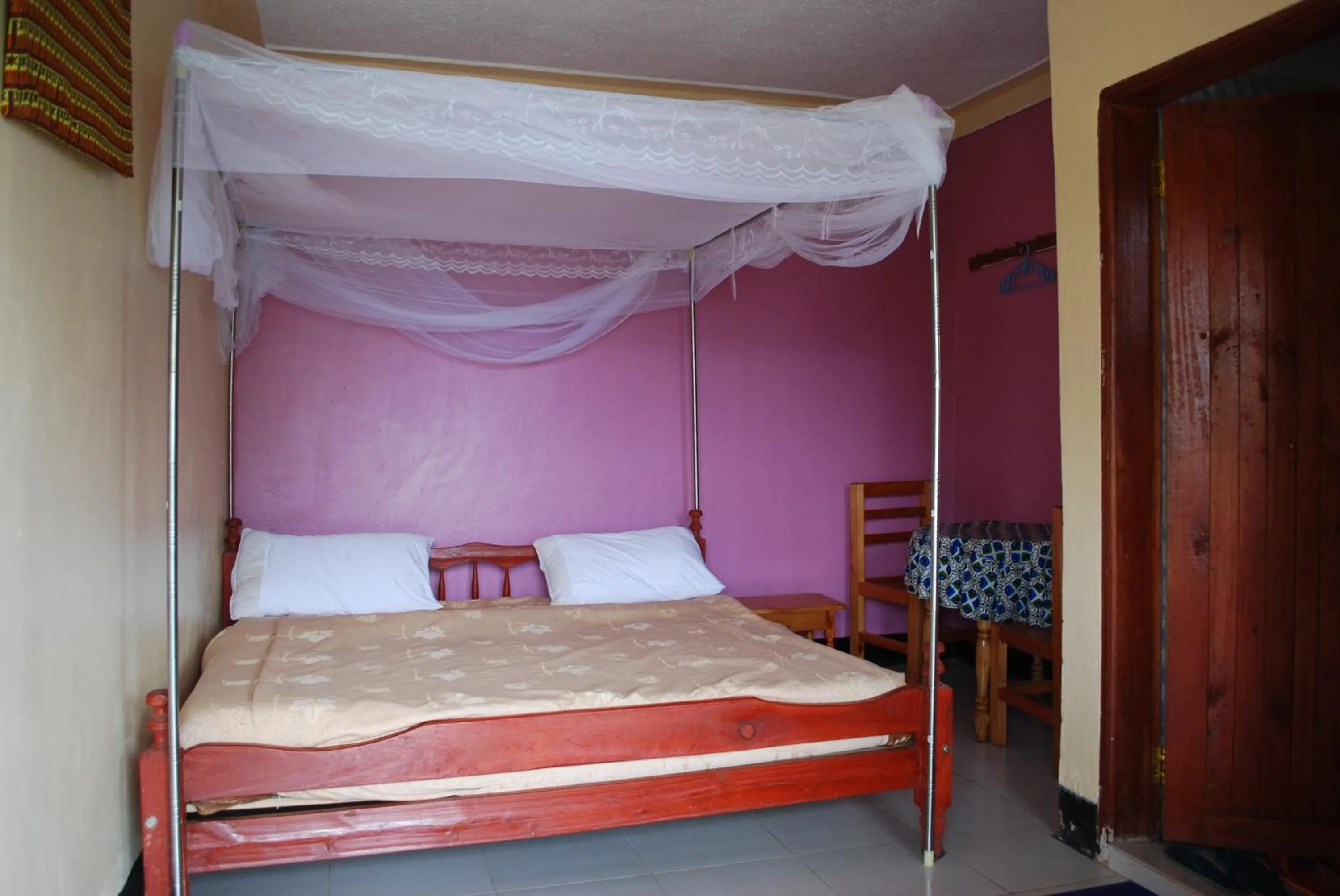 Bed in Crater Bay Cottages